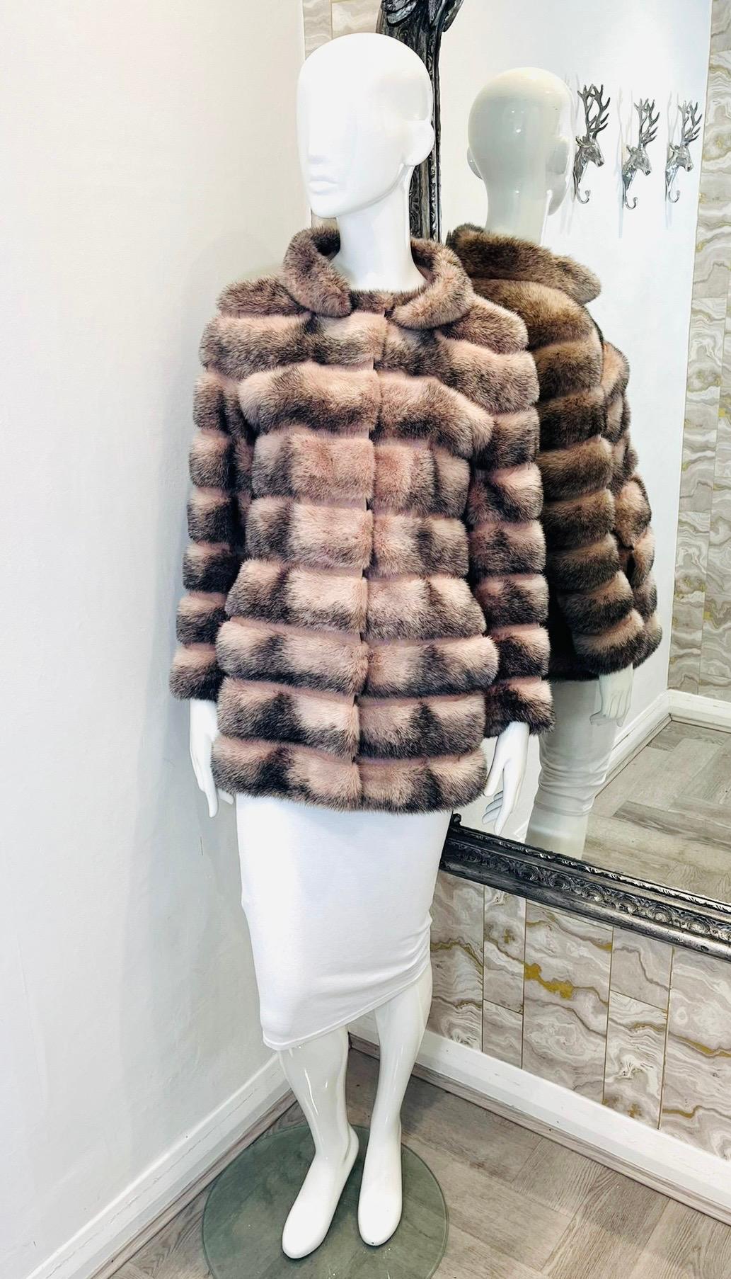 Fendi Mink Fur Coat

Dusty pink, luxurious, panelled fur coat designed with black blending.

Styled with collared neckline, long sleeves and side pockets. Silk stitching between the panels.

Size – 40IT

Condition – Very Good

Composition – 100%