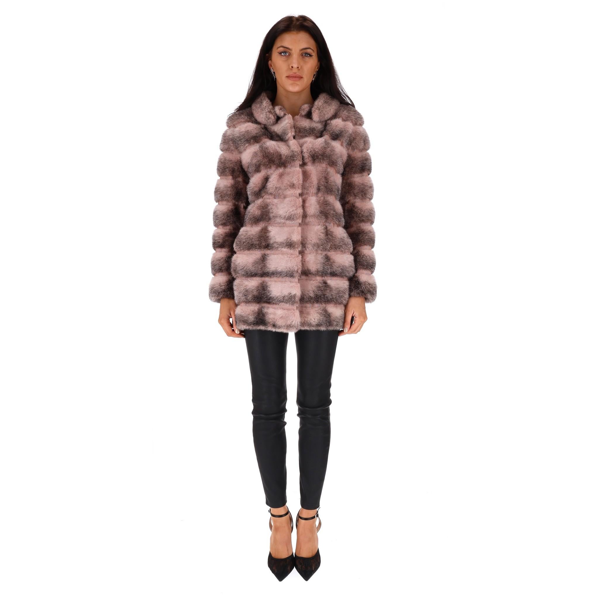 Fendi Mink Fur Coat

Dusty pink, luxurious, panelled fur coat designed with black blending.

Styled with collared neckline, long sleeves and side pockets. Silk stitching between the panels.

Size – 40IT

Condition – Excellent

Composition – 100%