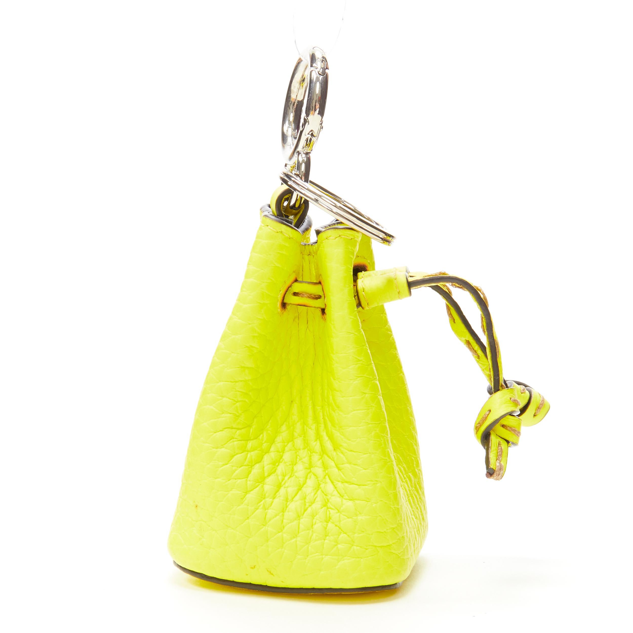 FENDI Mon Tresor Micro Bucket drawstring bright yellow leather bag charm 
Reference: ANWU/A00137 
Brand: Fendi 
Collection: Mon Amor 
Material: Leather 
Color: Yellow 
Pattern: Solid 
Closure: Drawstring 
Extra Detail: Functional drawstring, can