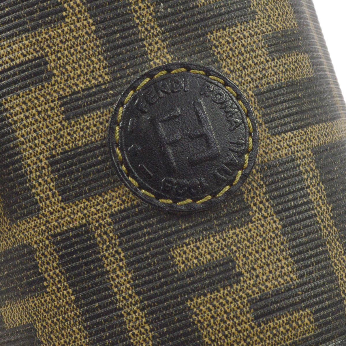 Fendi Monogram Canvas Black Green Gold Logo Evening Mini Top Handle Satchel Bag

Monogram canvas
Leather trim
Gold tone hardware
Leather lining 
Handle drop 2