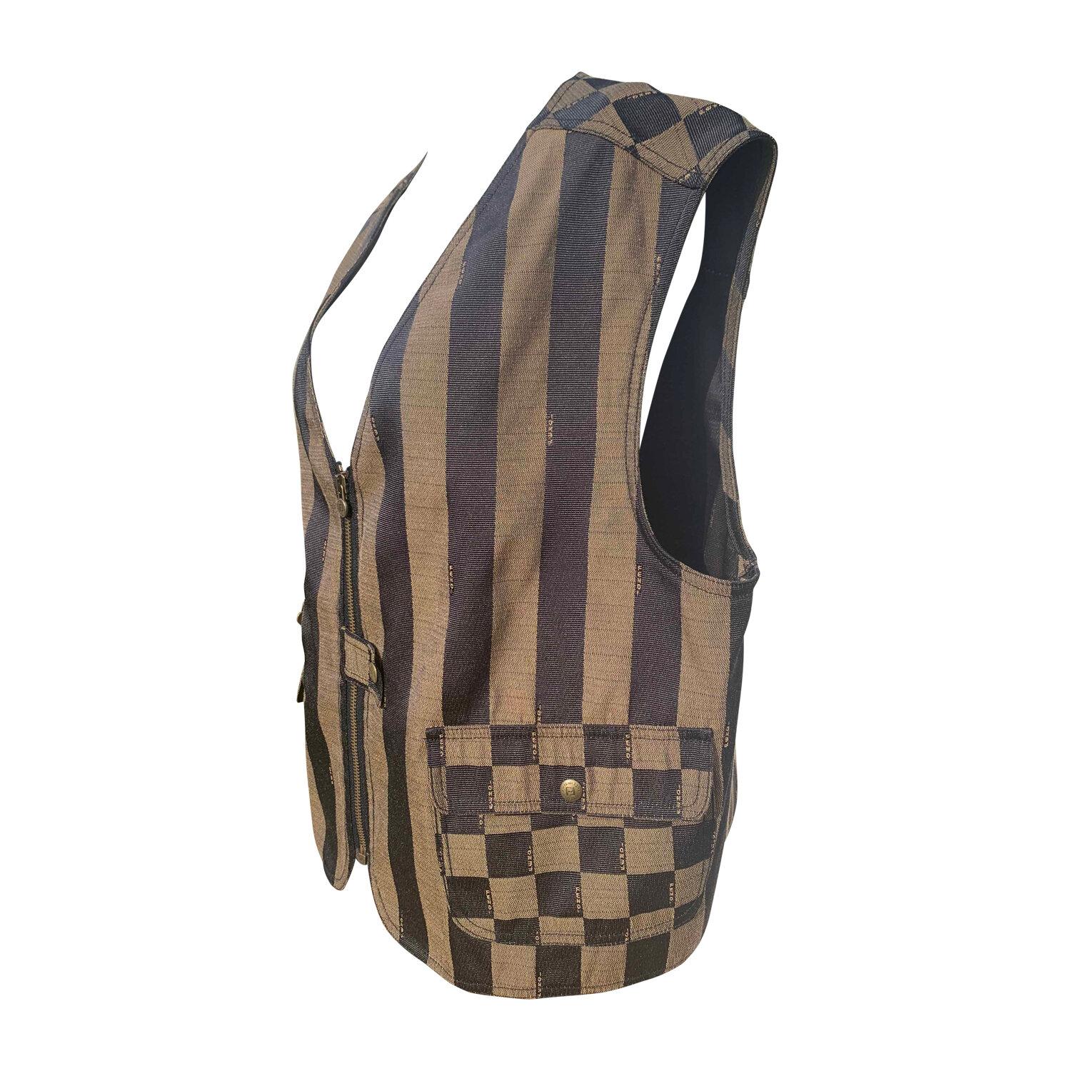 The Fendi hunter gilet, in the signature colors and monogram print.
Size: L
Condition: Excellent