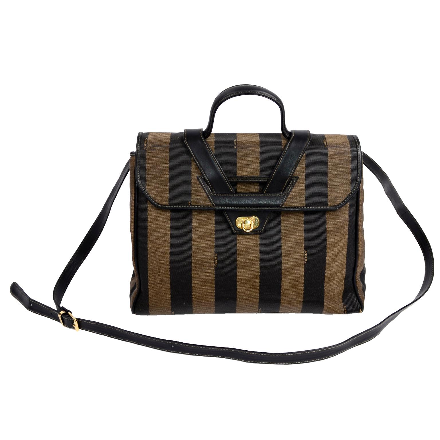 We love this fabulous Fendi Monogram Stripe bag with a top handle and optional shoulder straps.  This wonderful handbag measures 12