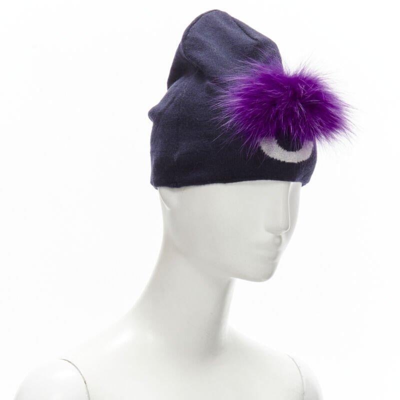 FENDI Monster Bug Eye  100% wool arctic fox fur trim navy purple beanie hat
Reference: ANWU/A00593
Brand: Fendi
Collection: Monster Bug
Material: Wool, Fur
Color: Navy, Purple
Pattern: Solid
Extra Details: Arctic for fux trim.
Made in:
