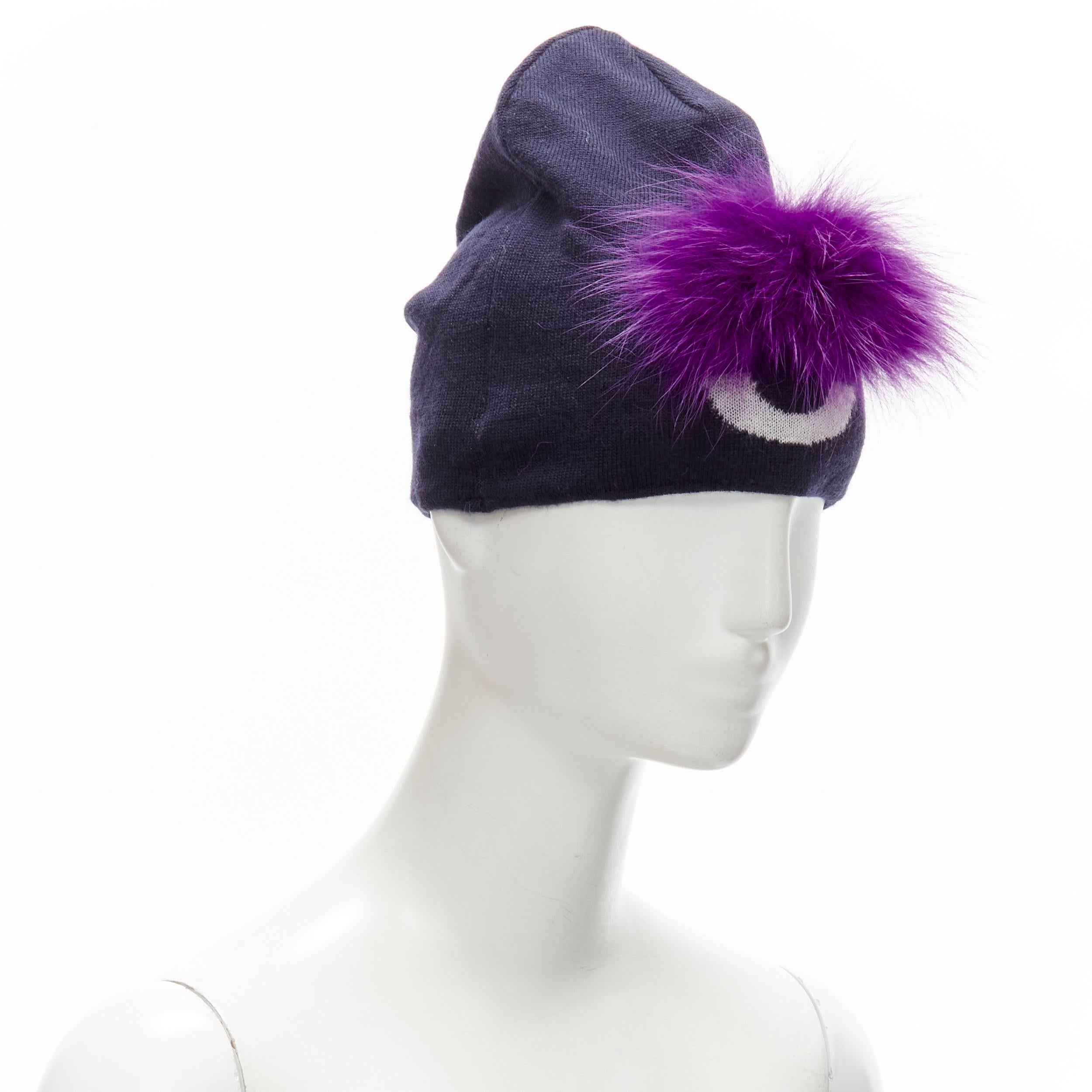 FENDI Monster Bug Eye  100% wool arctic fox fur trim navy purple beanie hat
Brand: Fendi
Collection: Monster Bug 
Material: Wool
Color: Navy
Pattern: Solid
Extra Detail: Arctic for fux trim.
Made in: Italy

CONDITION:
Condition: Excellent, this item