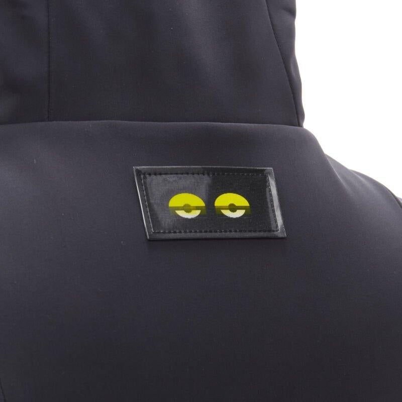 FENDI Monster Bug Eye black yellow fur trim ski jacket IT38 XS
Reference: ANWU/A00457
Brand: Fendi
Collection: Monster Bug
Material: Nylon
Color: Black, Yellow
Pattern: Graphic
Closure: Zip
Lining:  Polyester
Extra Details: FOx fur trimming on flap
