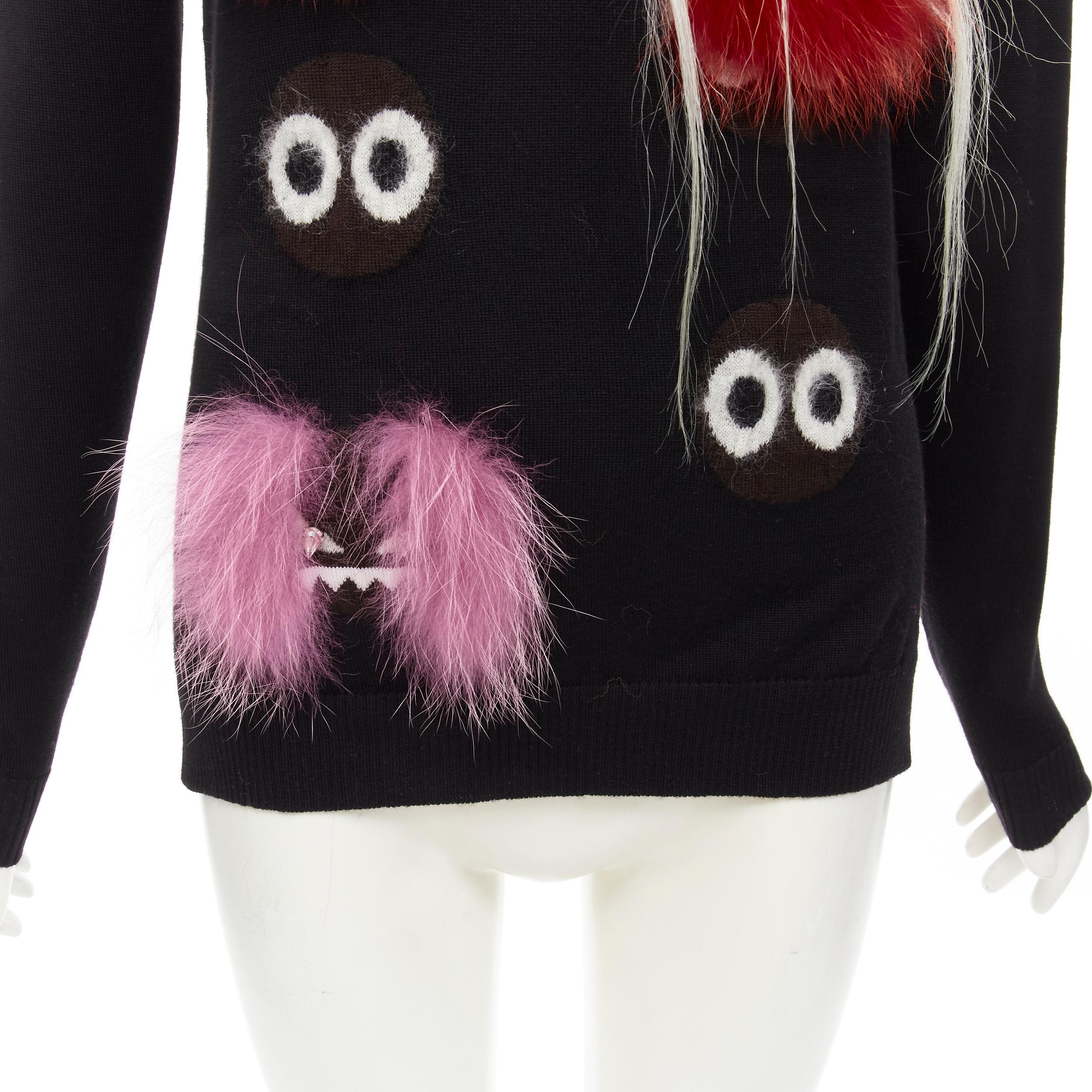 FENDI Monster Bug Eye fur trimmed cartoon eyes black turtleneck sweater XS
Brand: Fendi
Material: Feels like wool
Color: Black
Pattern: Abstract
Extra Detail: Genuine fur trim.

CONDITION:
Condition: Excellent, this item was pre-owned and is in