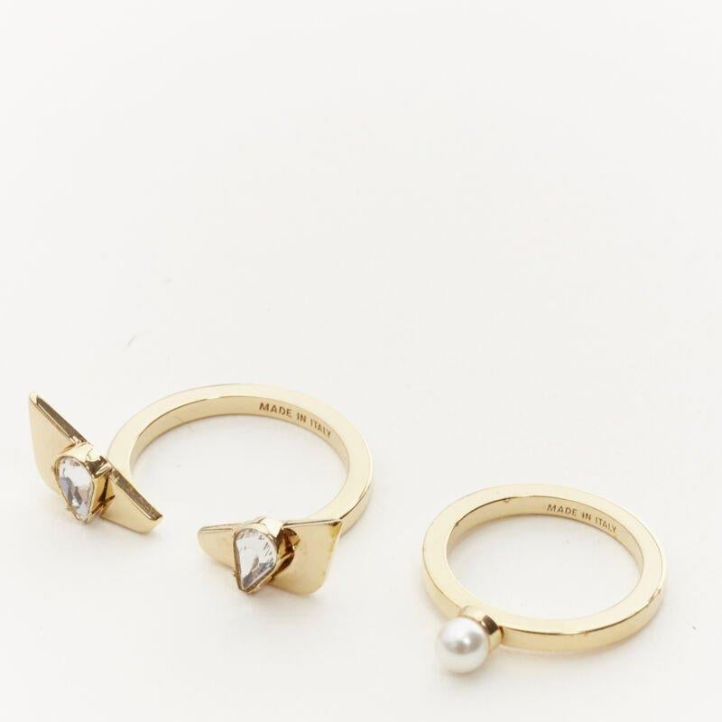 FENDI Monster Bug eye gold crystal pearl embellished rings US6.5 US4
Reference: ANWU/A00152
Brand: Fendi
Material: Metal
Color: Gold
Extra Details: Monster Bug eye ring size US 6.5. Pearl midi ring size US 4.

CONDITION:
Condition: Excellent, this