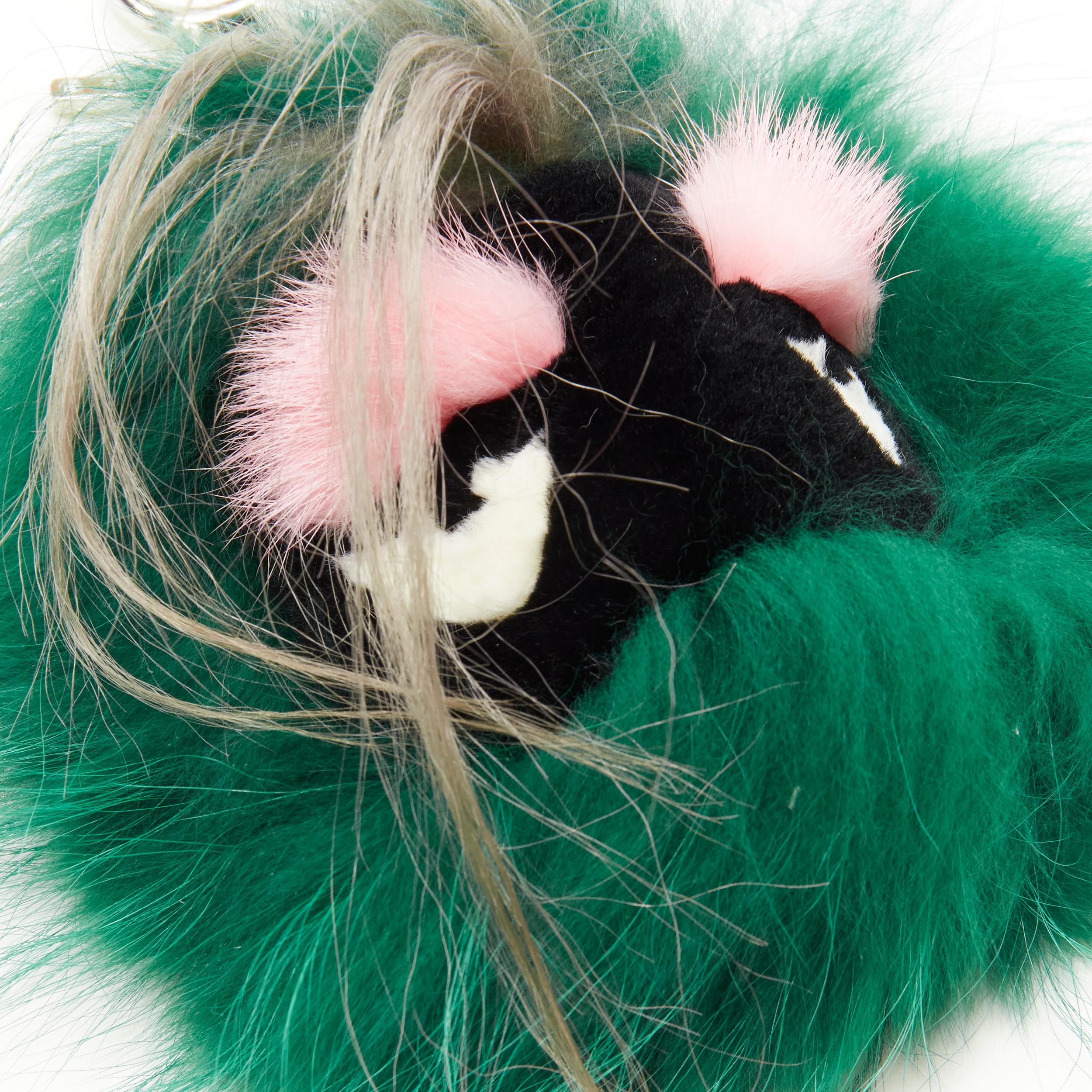 FENDI Monster Bug green black mixed fox rabbit mink key ring bag char
Reference: ANWU/A00119 
Brand: Fendi 
Material: Fur 
Color: Green 
Pattern: Solid 
Extra Detail: Leather trim with silver-tone hardware. 

CONDITION: 
Condition: Excellent, this