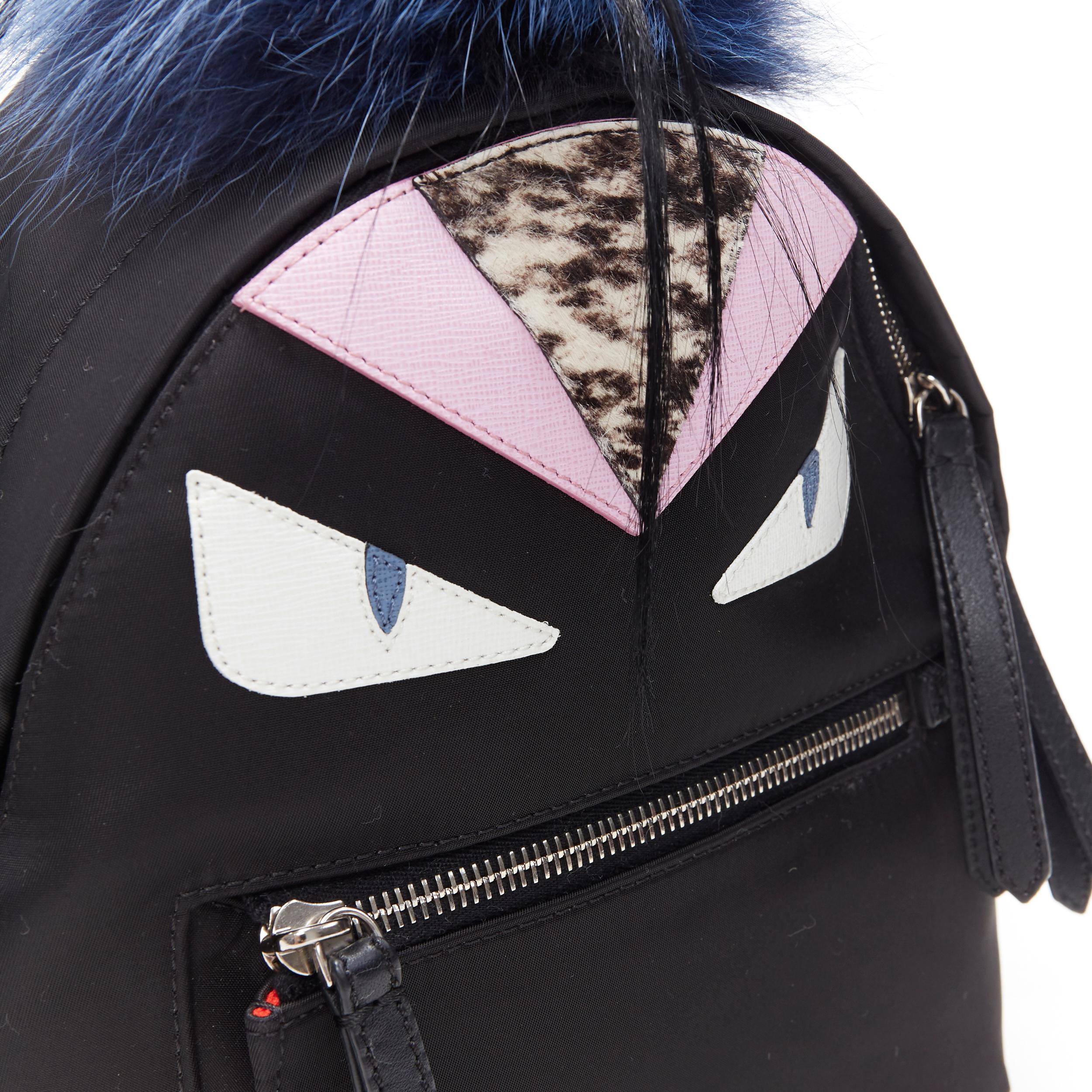 Black FENDI Monster Eyes Zaino fox fur trimmed chain linked black nylon small backpack