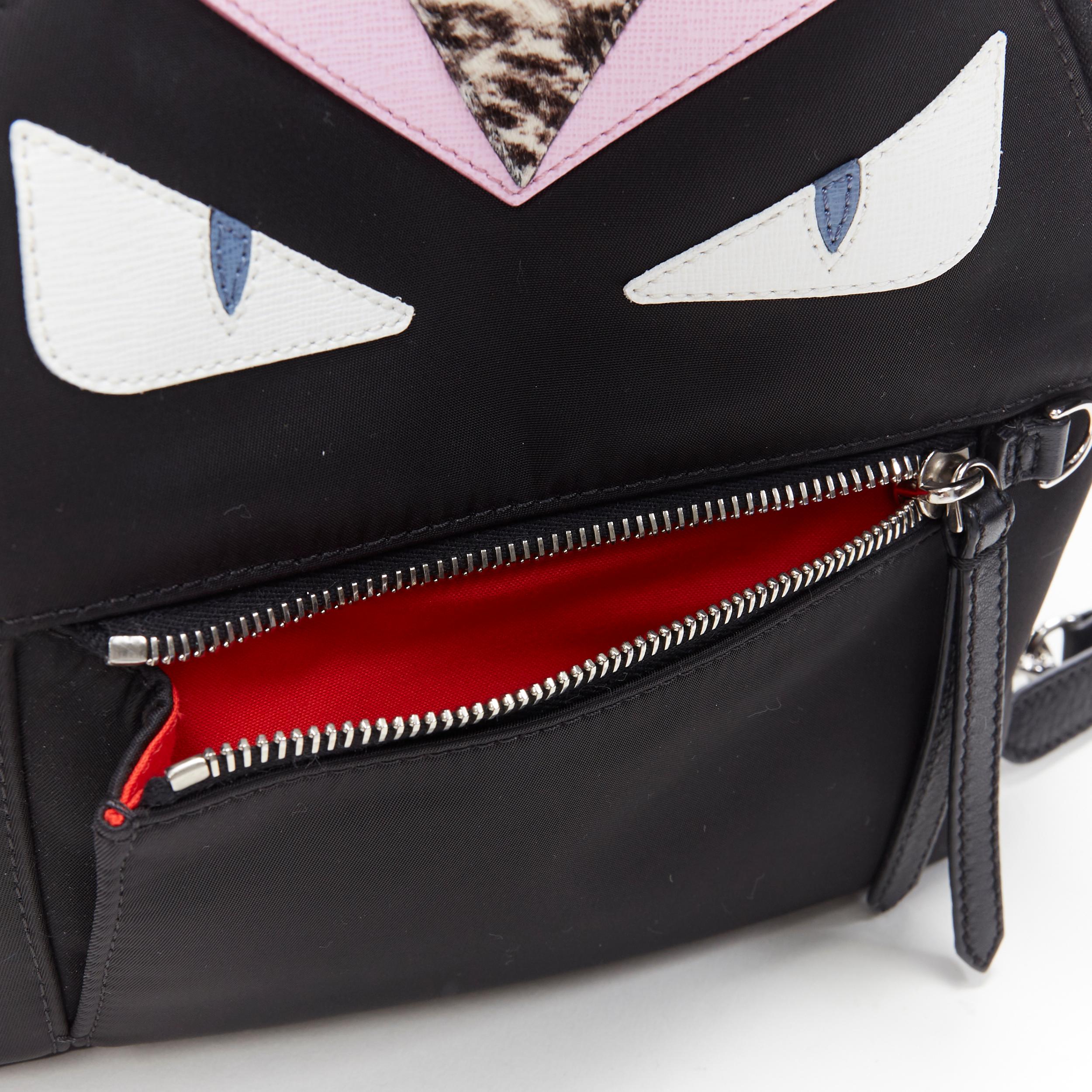 FENDI Monster Eyes Zaino fox fur trimmed chain linked black nylon small backpack In Good Condition In Hong Kong, NT