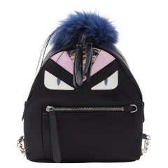 FENDI Monster Eyes Zaino fox fur trimmed chain linked black nylon small backpack