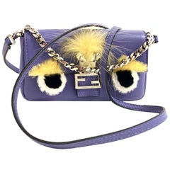FENDI Monster Mini Baguette Tasche In lila Leder