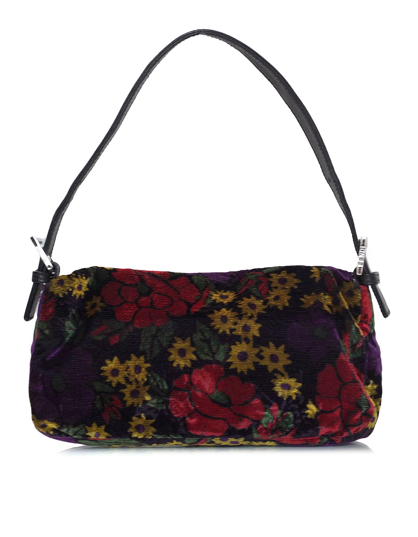 Fendi Multi-Colored Floral Print Velvet Baguette
Features adjustable leather wrapped handle and leather trim

Made In: Italy
Color: Multi-colored
Hardware: Silvertone
Materials: Velvet and leather
Lining: Black canvas
Closure/Opening: Flap top with