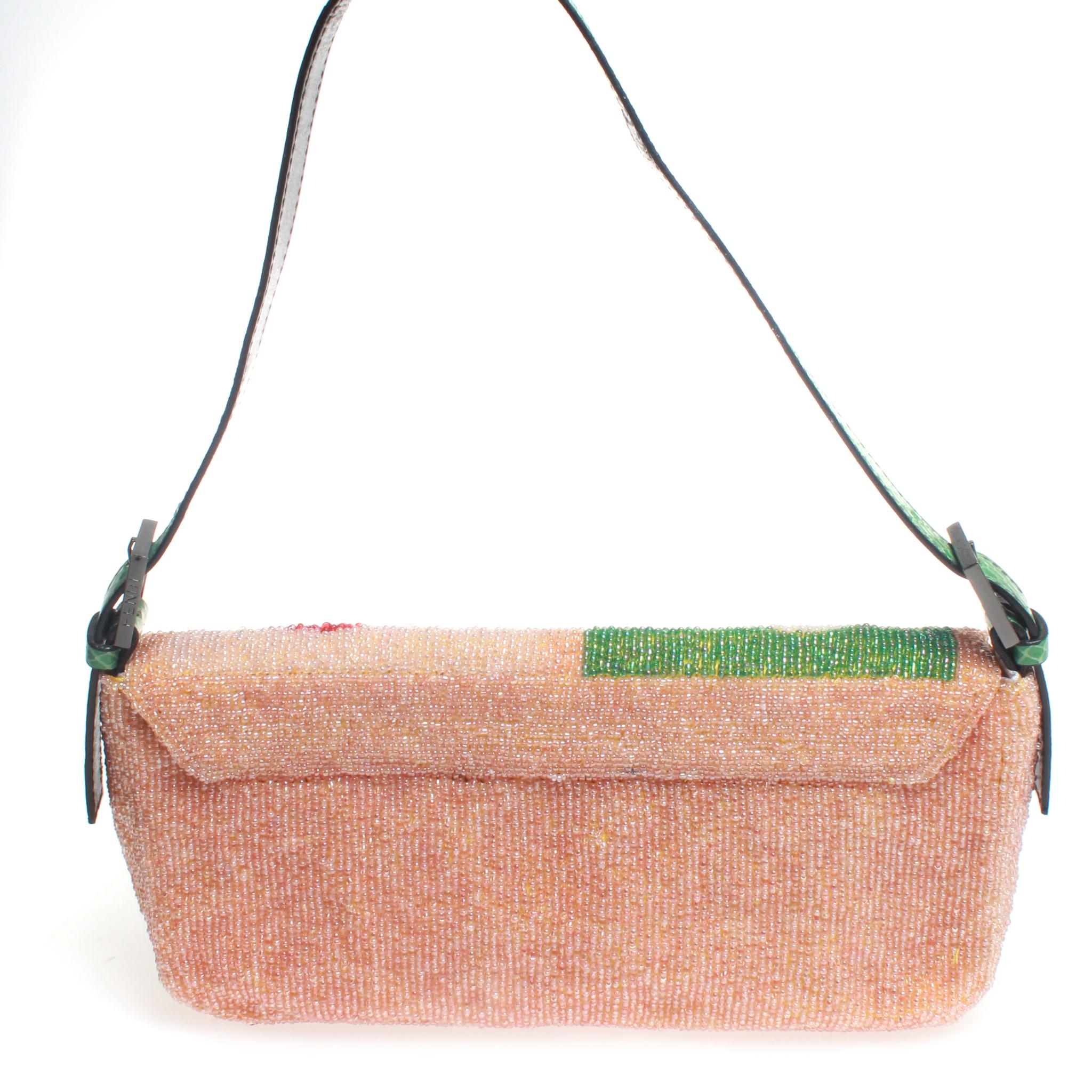Incredibly detailed Fendi multi needle point beaded baguette bag with green snakeskin strap and magnetic front flap closure. This Fendi baguette is perfect for adding an explosion of color to any outfit with it's magnificent geometric patterns in