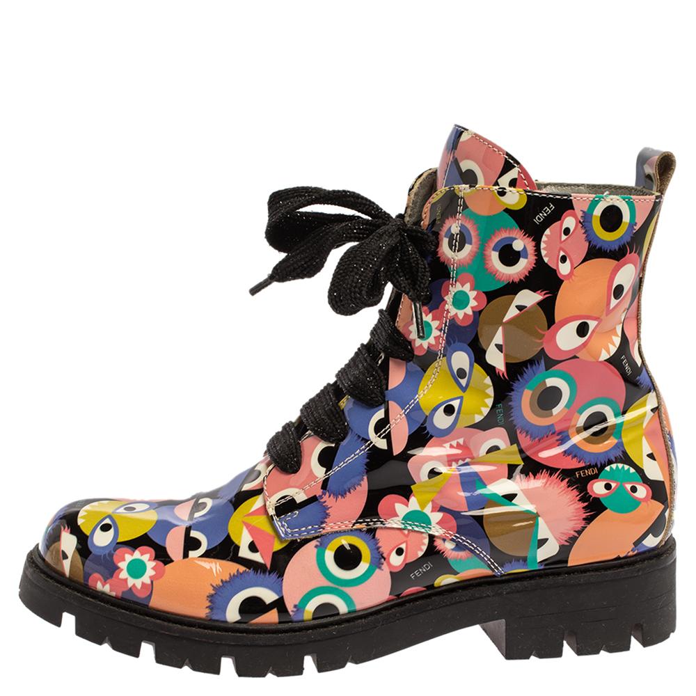 These stylish and playful combat boots hail from the iconic house of Fendi. These boots are a great way to add a pop of color to your ensembles and will make sure you are the talk of the town. They have been crafted from patent leather and carry a