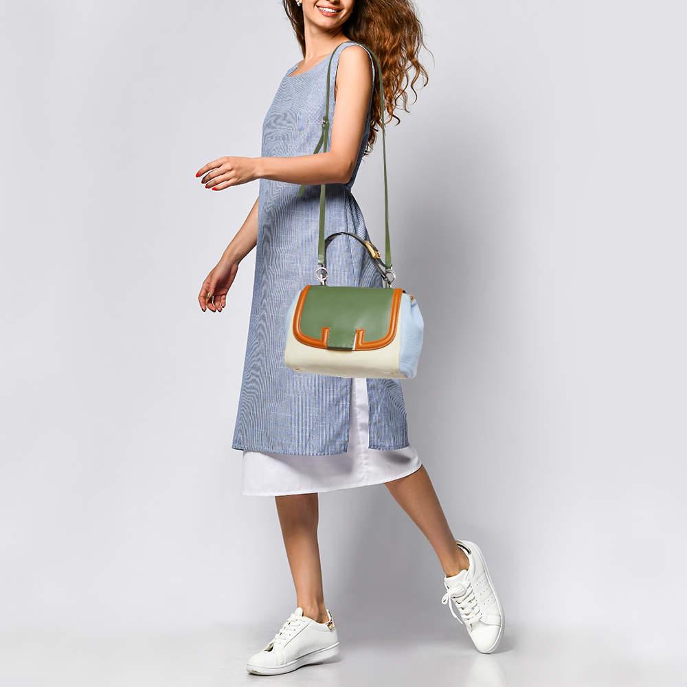 Designer bags are ideal companions for ample occasions! Here we have a fashion-meets-functionality piece crafted with precision. It has been equipped with a well-sized interior that can easily fit all your essentials.

Includes: Detachable Strap,
