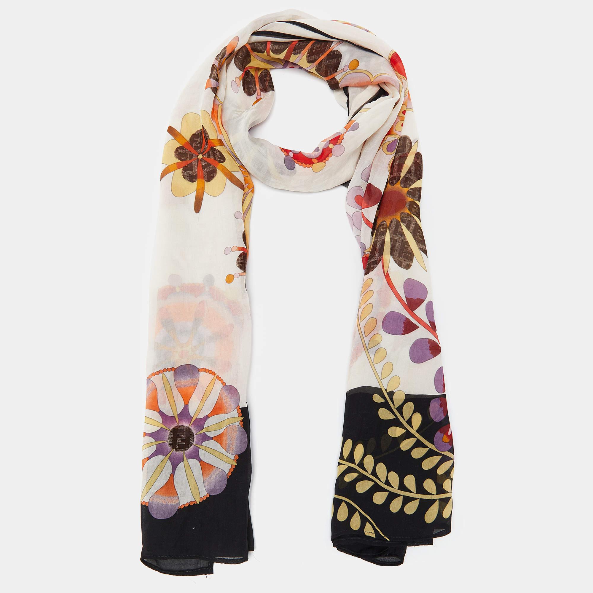 Elevate your style with this meticulously crafted stole. Prints and timeless design unite for an exquisite accessory that exudes sophistication and style.

