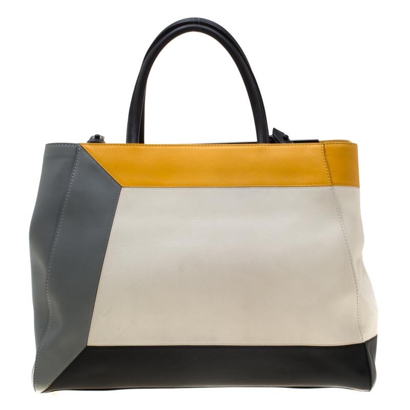 Fendi's 2Jours tote is one of the most iconic designs from the label and it still continues to receive the love of women around the world. Crafted from multicolor leather, the bag features double rolled handles and a shoulder strap. It is also