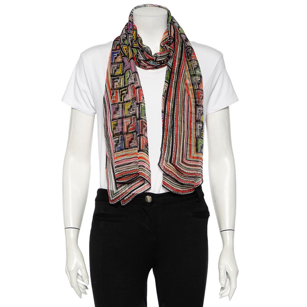 From the house of Fendi, this beautiful scarf is a perfect addition to your cherished collection of accessories. Lovely to look at and instantly recognizable, this creation will compliment any outfit you wear. The multicolored scarf is made of silk