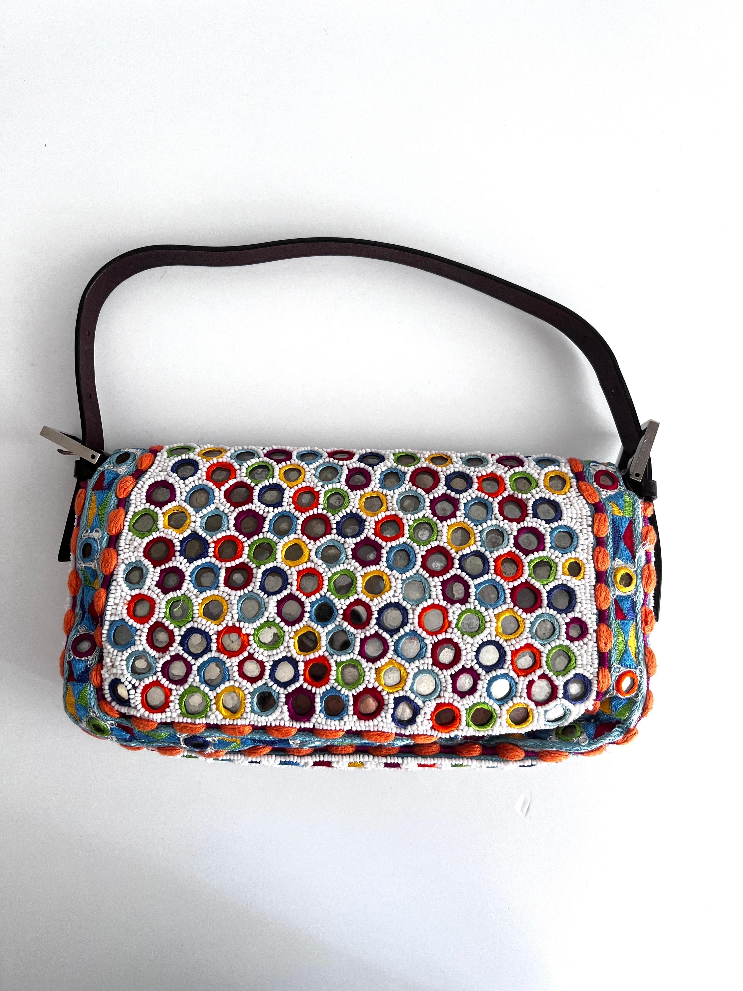 Fendi multicolor mirror baguette
This style was collected into the Fendi baguette book
Never worn condition
But because of her age
It has minor glue transfer on the edge of the flap, but not noticeable
Some mirrors tarnished
Clean interior
No beads