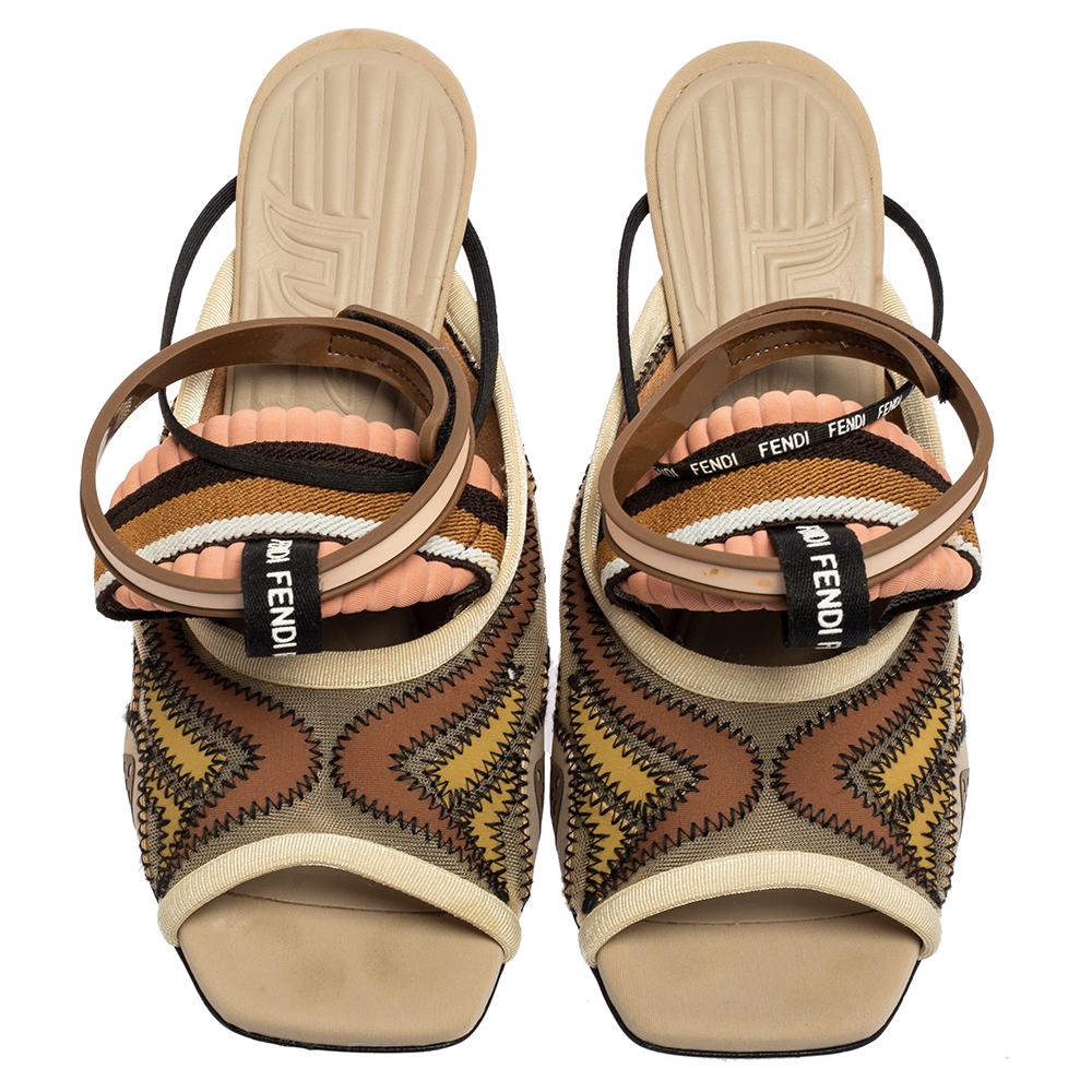 A mix of layers, colors, and distinct stitches bring out the charm of these Fendi Freedom FF sandals. They're made using mesh, neoprene, rubber, and designed with open toes, ankle straps, and 10.5 cm ribbed heels.

Includes: Original Box, Info