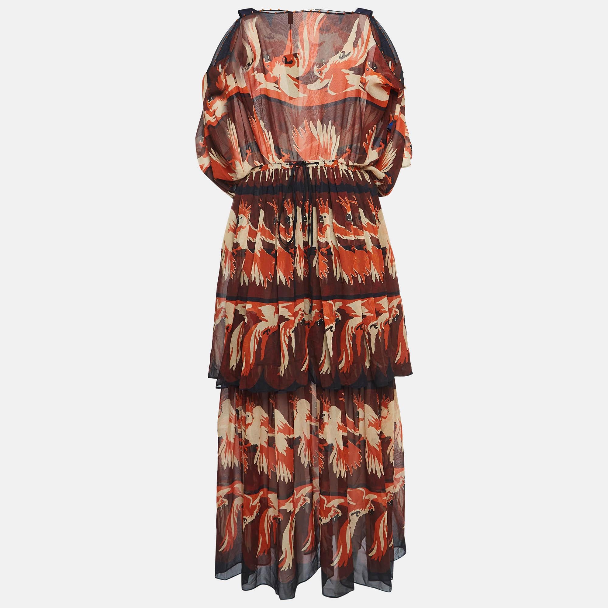 This Fendi maxi dress is a fashionable and versatile piece that exudes elegance and comfort. With its long silhouette, it provides a flattering and feminine look. Designed with chic details and unique cuts, it effortlessly combines fashion and