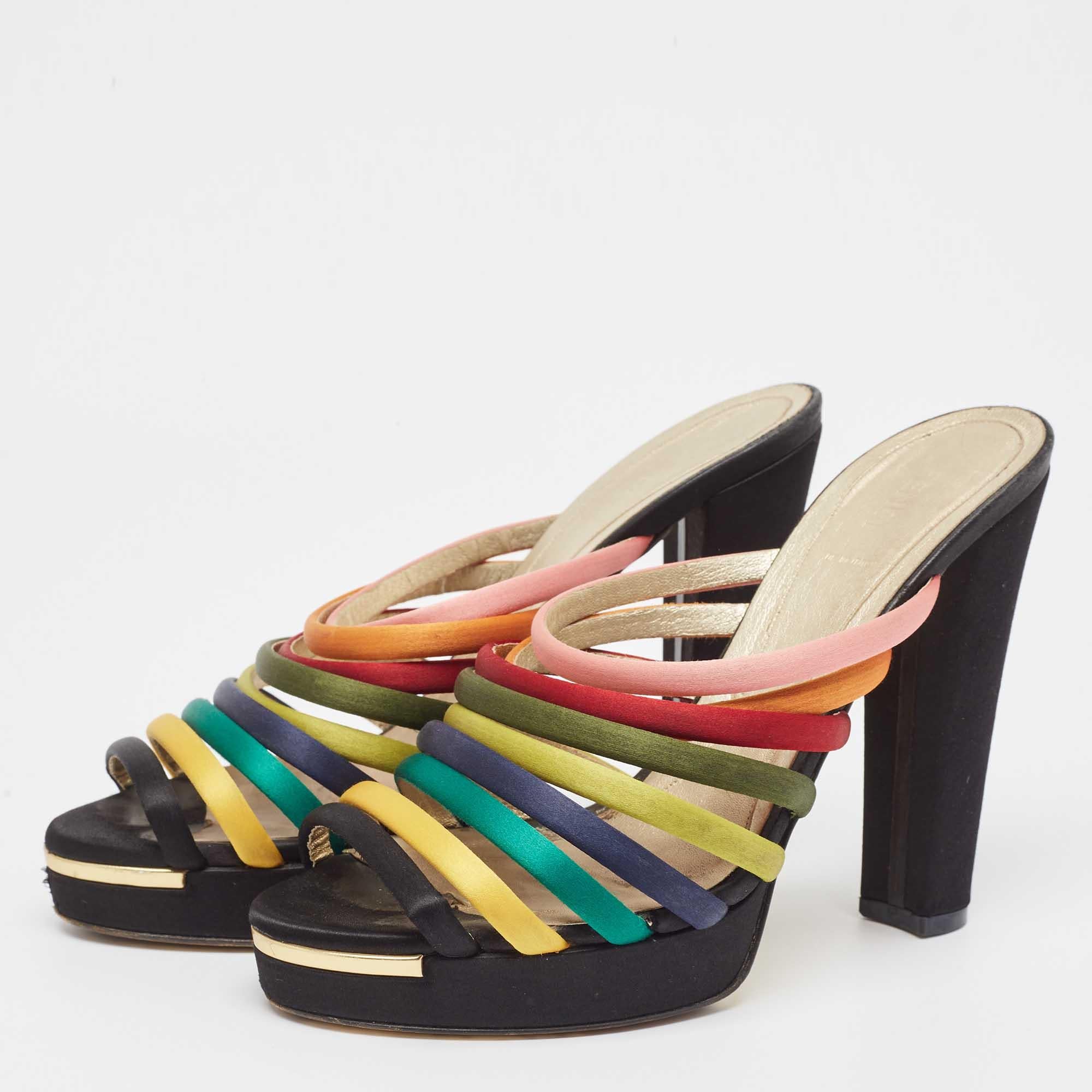 These sandals embody the perfect blend of edgy and timeless style. Crafted from quality materials, these shoes will offer you the perfect height for a sophisticated look.

