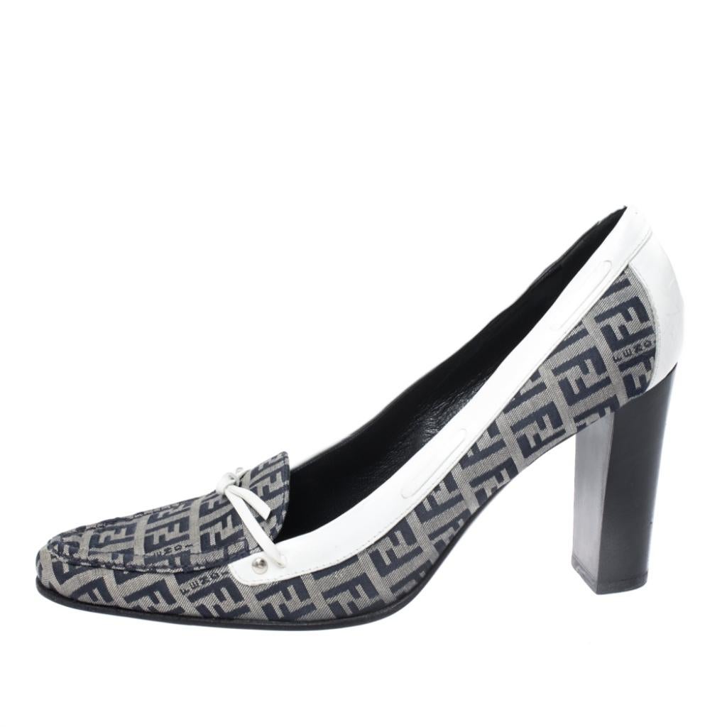 This pair of pumps by Fendi will let you make the most amazing style statement. They are crafted from Zucca coated canvas and leather trims featuring square toes and block heels. Add a dressy touch to your daily outfit with these exquisite
