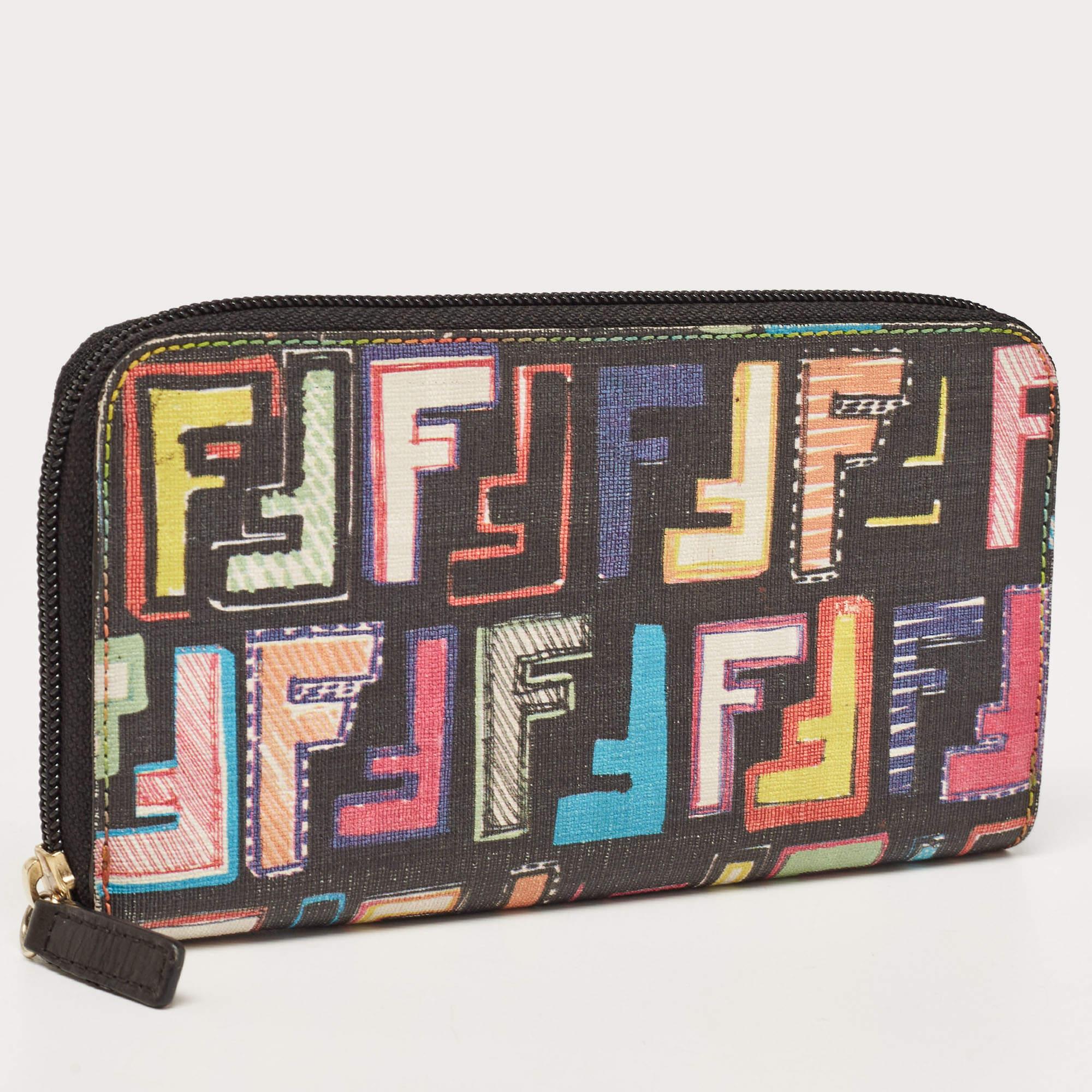 Add the Fendi touch to your everyday accessories by owning this wallet! It is made from multicolor Zucca coated canvas and its interior is secured by a zip closure. The interior flaunts multiple card slots, open compartments for cash or bills and a