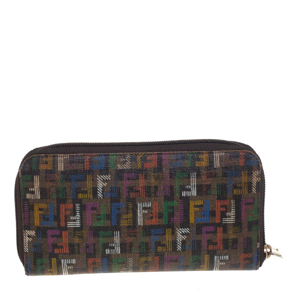 Basic essentials can be carried effortlessly in this Zuccchino coated canvas wallet. Store your daily essentials and put together a stylish look with this wallet from Fendi. The multicolored hues of this stylish wallet make you stand out wherever