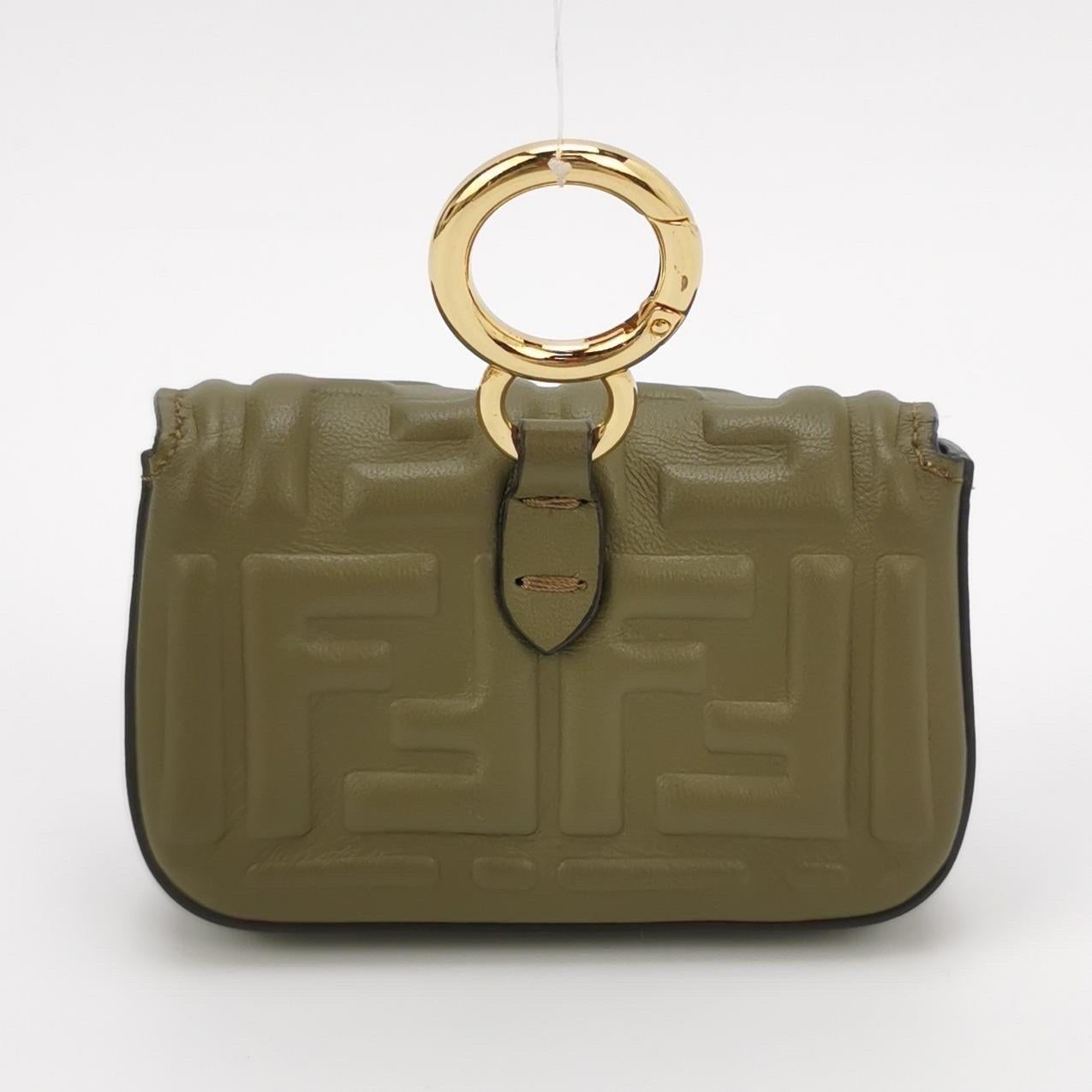  CONDITION: EXCELLENT
 Scratches on the front buckle, Leather creases. 
 DETAILS
 
 Fendi 
 Nano Baguette
 Material: Lambskin leather
 Color: Dark green
 Width 4.75