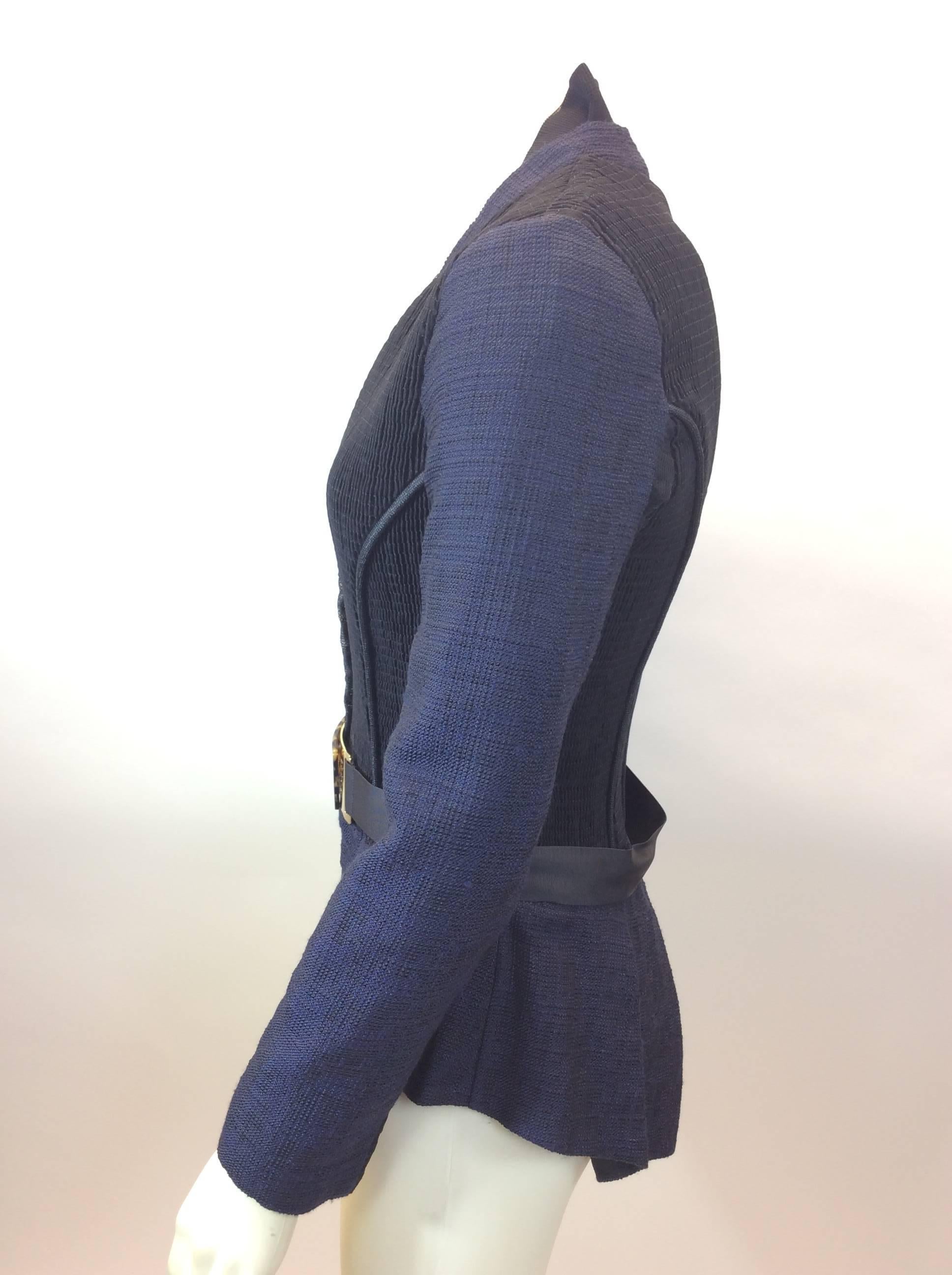Fendi Navy Blue and Black Jacket
With Belt
$799
Made in Italy
Size 44
Length 23