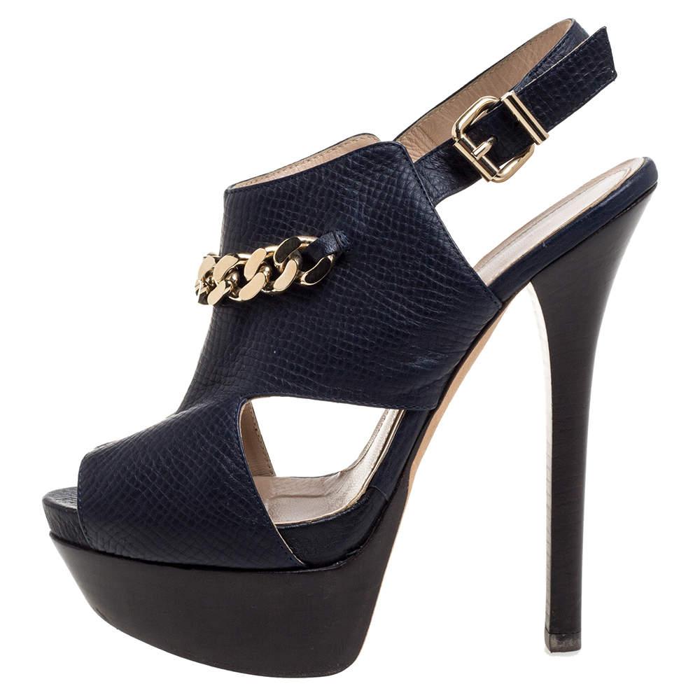 Fendi's sandals are designed in an interesting silhouette with a sturdy body. They are set on high platforms and heels and features a stylish chain detail with cutouts on the vamps. Lined with leather on the insole, these slingbacks will work well