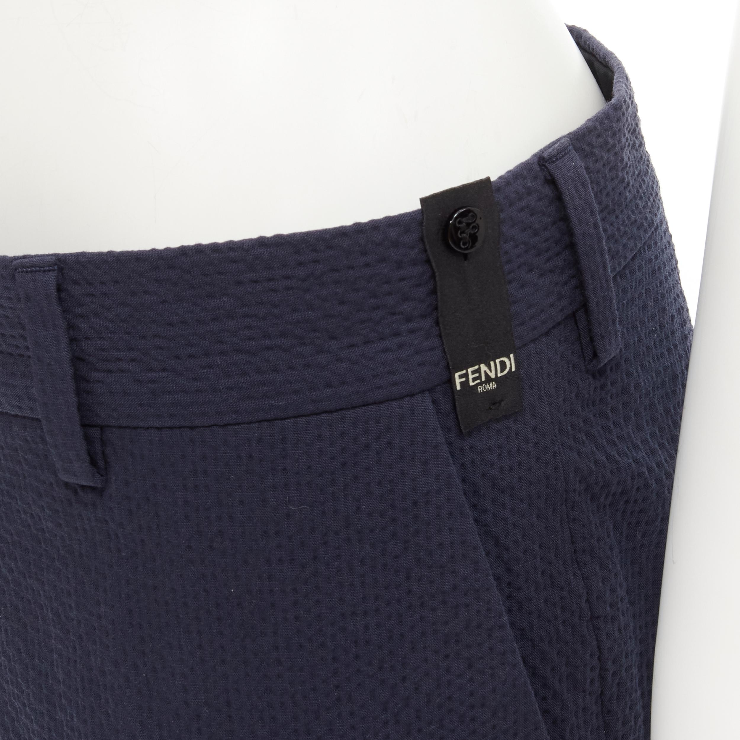 FENDI navy blue seersucker cotton blend trousers pants IT44 XS 
Reference: CRTI/A00731 
Brand: Fendi 
Material: Cotton 
Color: Blue 
Pattern: Solid 
Closure: Zip 
Made in: Italy 

CONDITION: 
Condition: Excellent, this item was pre-owned and is in