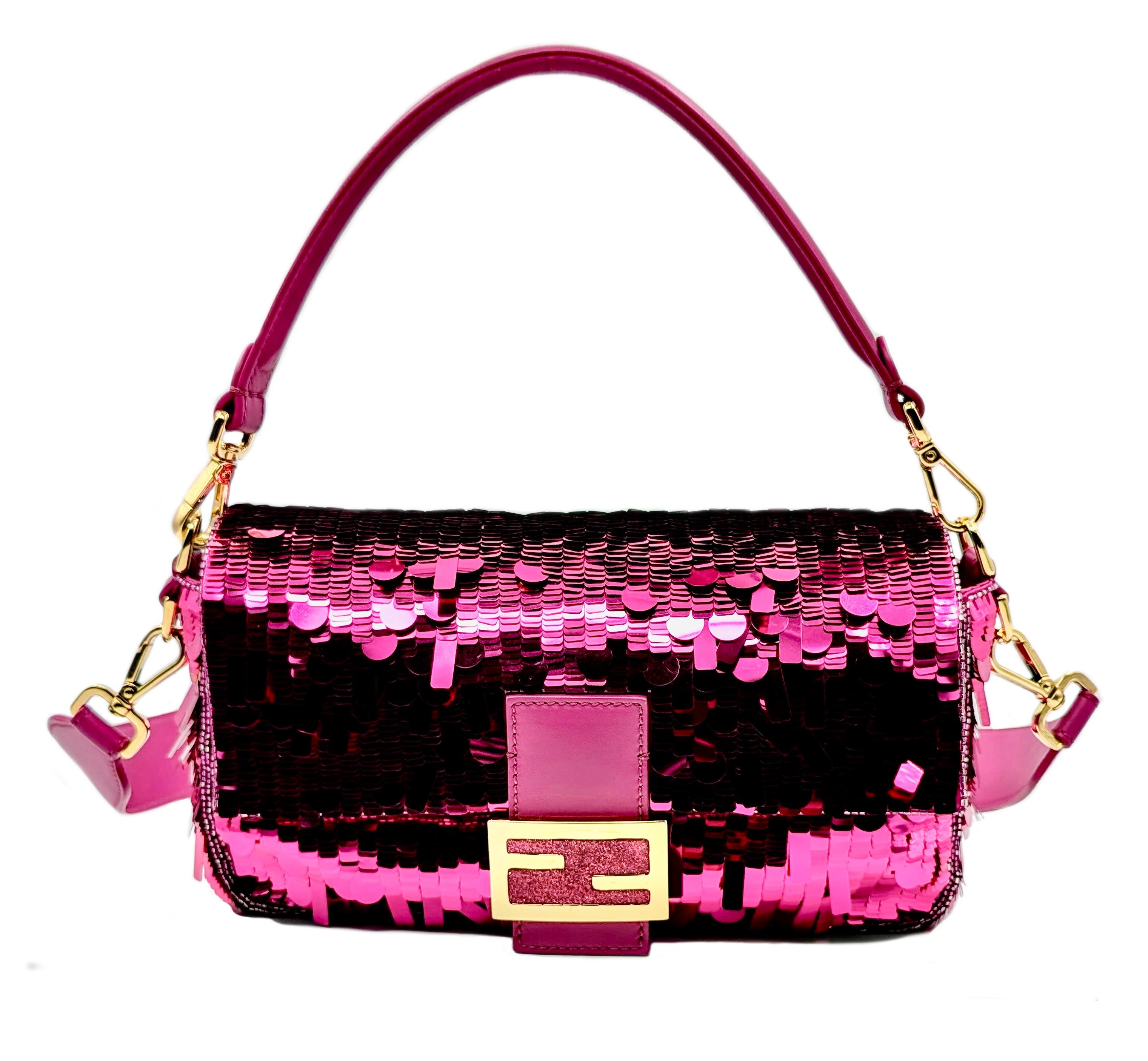 FENDI
New pink sequins baguette 2024
Iconic medium-sized Baguette bag, finely embroidered all-over with pink sequins in different shapes and sizes for a 3D effect and decorated with FF closure. 
This model is a re-edition of the original version