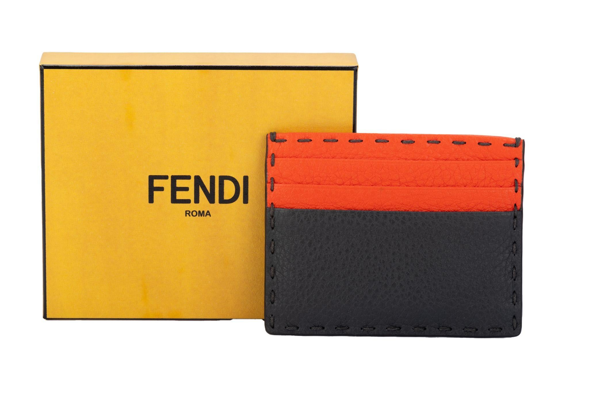 Fendi new limited edition selleria hand stitched two tone credit card wallet. Grey and coral leather. Box and original dustcover.