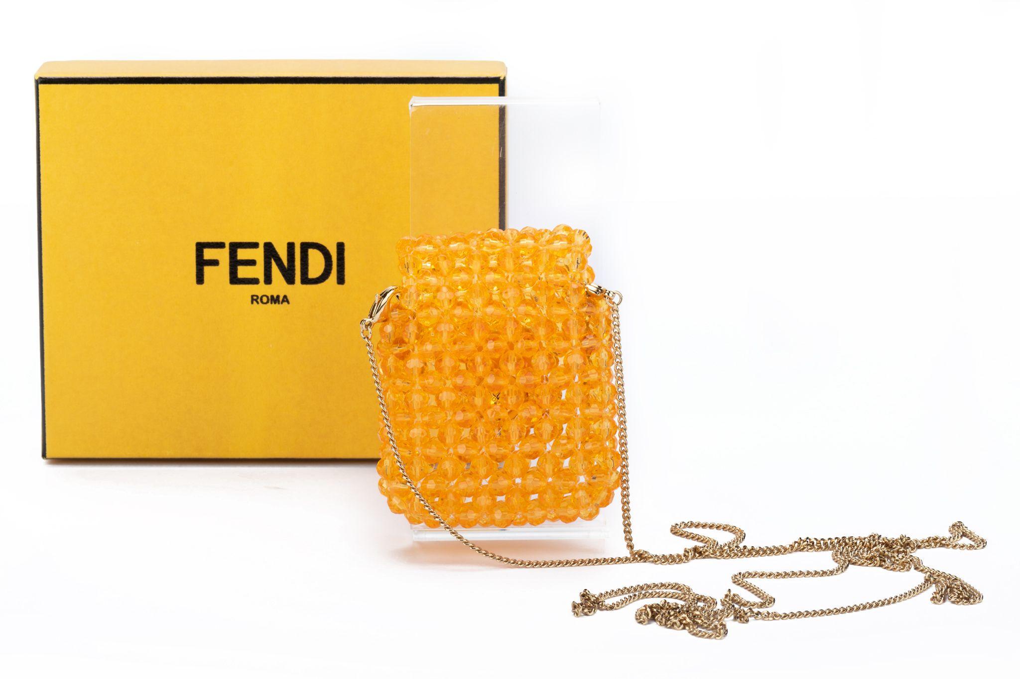 Fendi BNIB pico baguette in pale orange plastic beads with gold hardware. Can be used fro air pods 1 st generation. 23 inch detachable shoulder strap Comes with booklet, box and original dustcover.