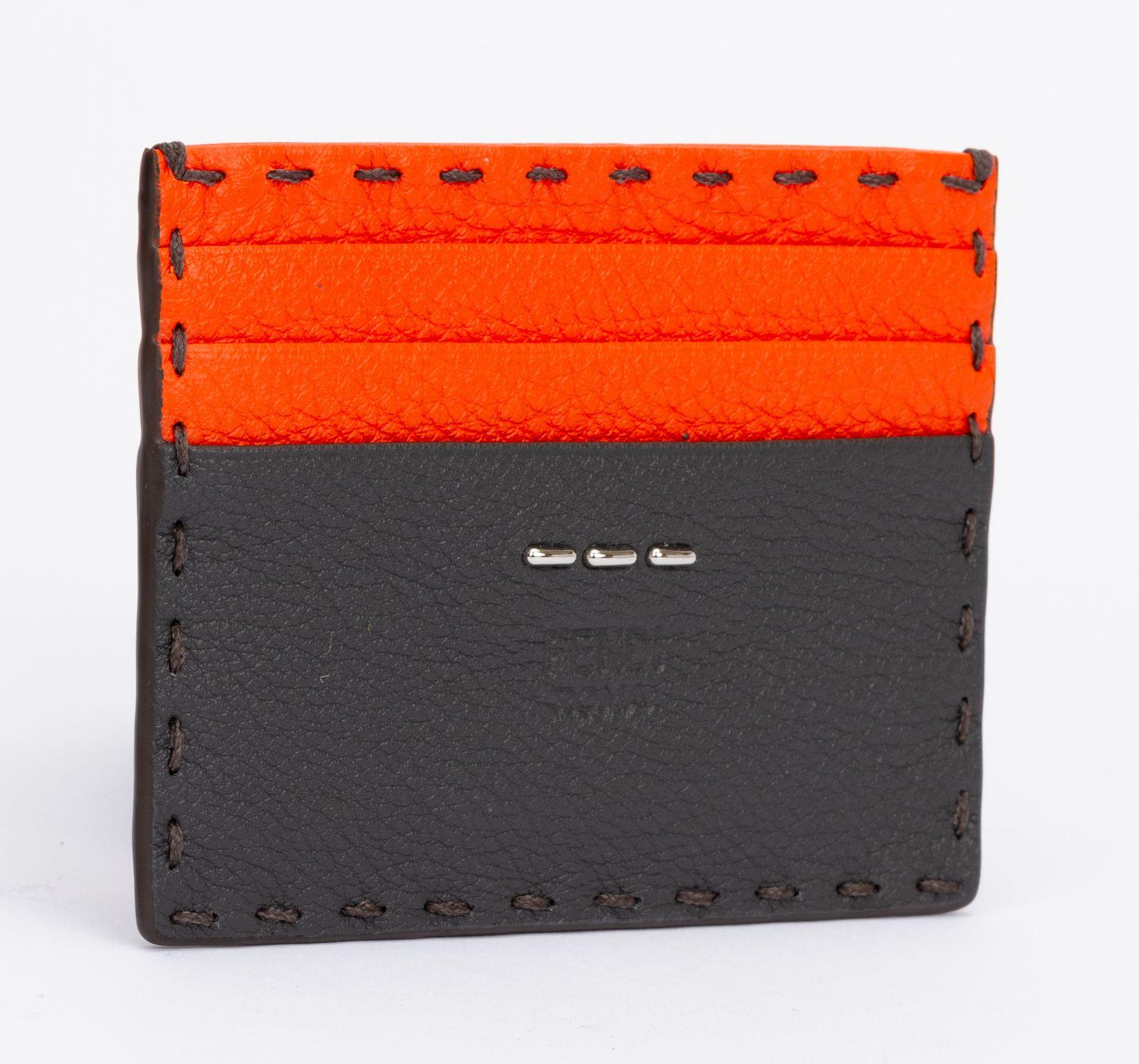 Fendi new Selleria hand made 2 tone credit card case. Includes tag, original box and dust cover.