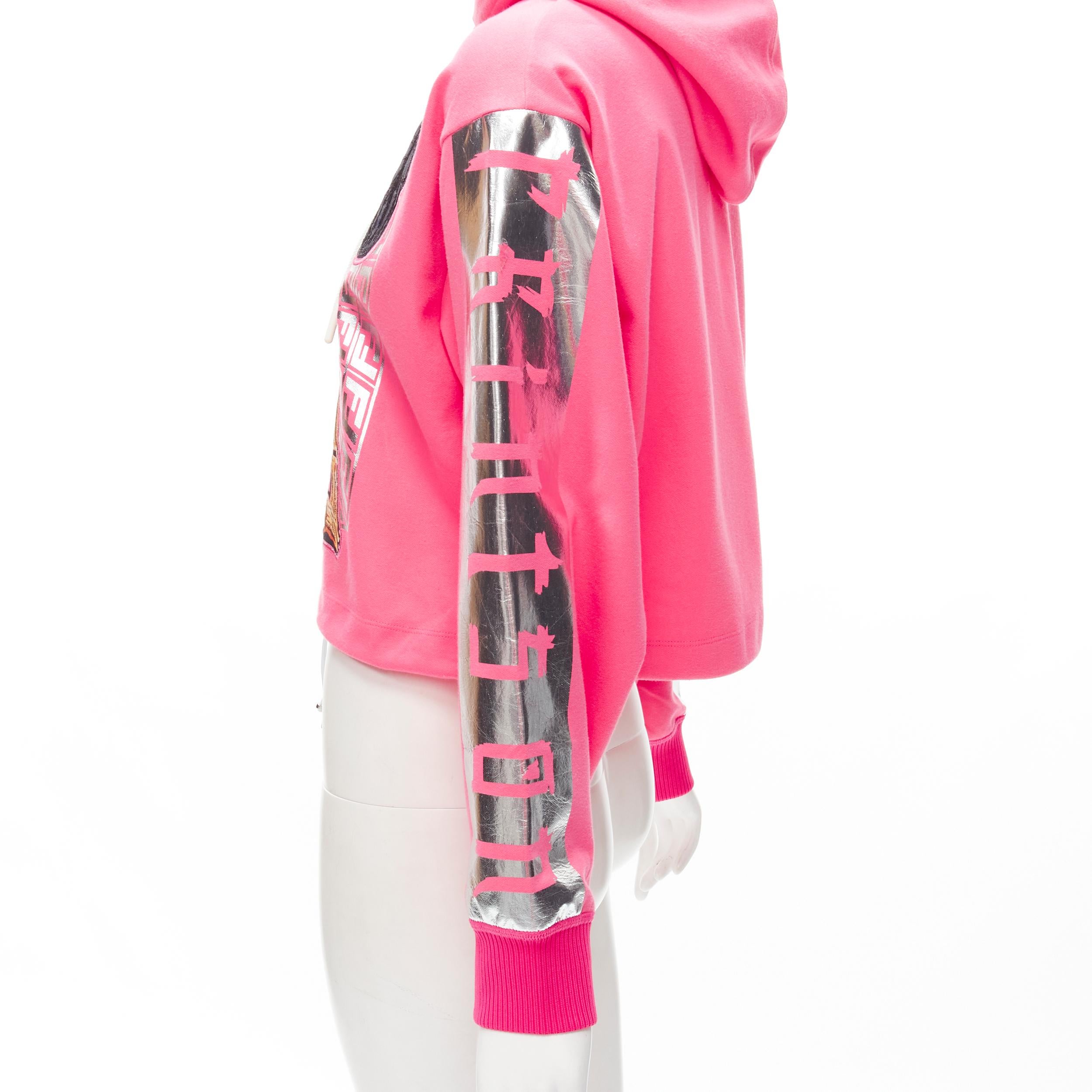 FENDI Nicki Minaj Prints On pink silver foil print cropped hoodie S 
Reference: ANWU/A00470 
Brand: Fendi 
Collection: Nicki Minaj Prints On 
Material: Cotton 
Color: Pink 
Pattern: Solid 
Extra Detail: Drawstring hood and at hem. 

CONDITION: