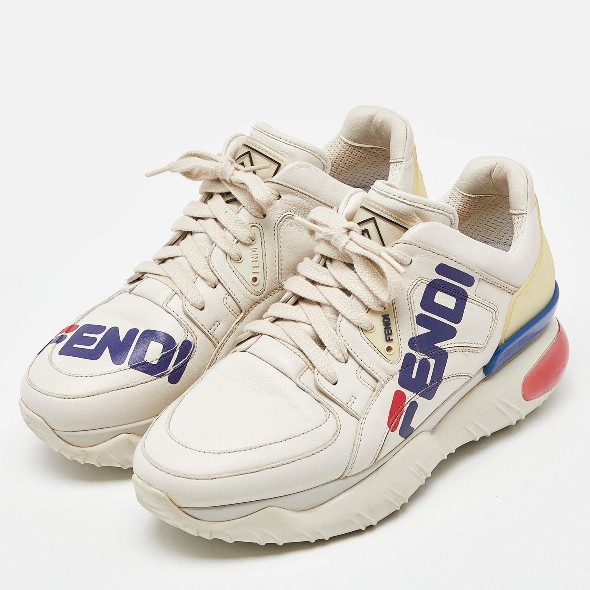 These sneakers are from the collaboration between Fendi and Fila. Made from leather and rubber, they feature durable soles and lace-up vamps. Fila's signature red and blue as well as other elements are seamlessly incorporated into the Fendi pair.
