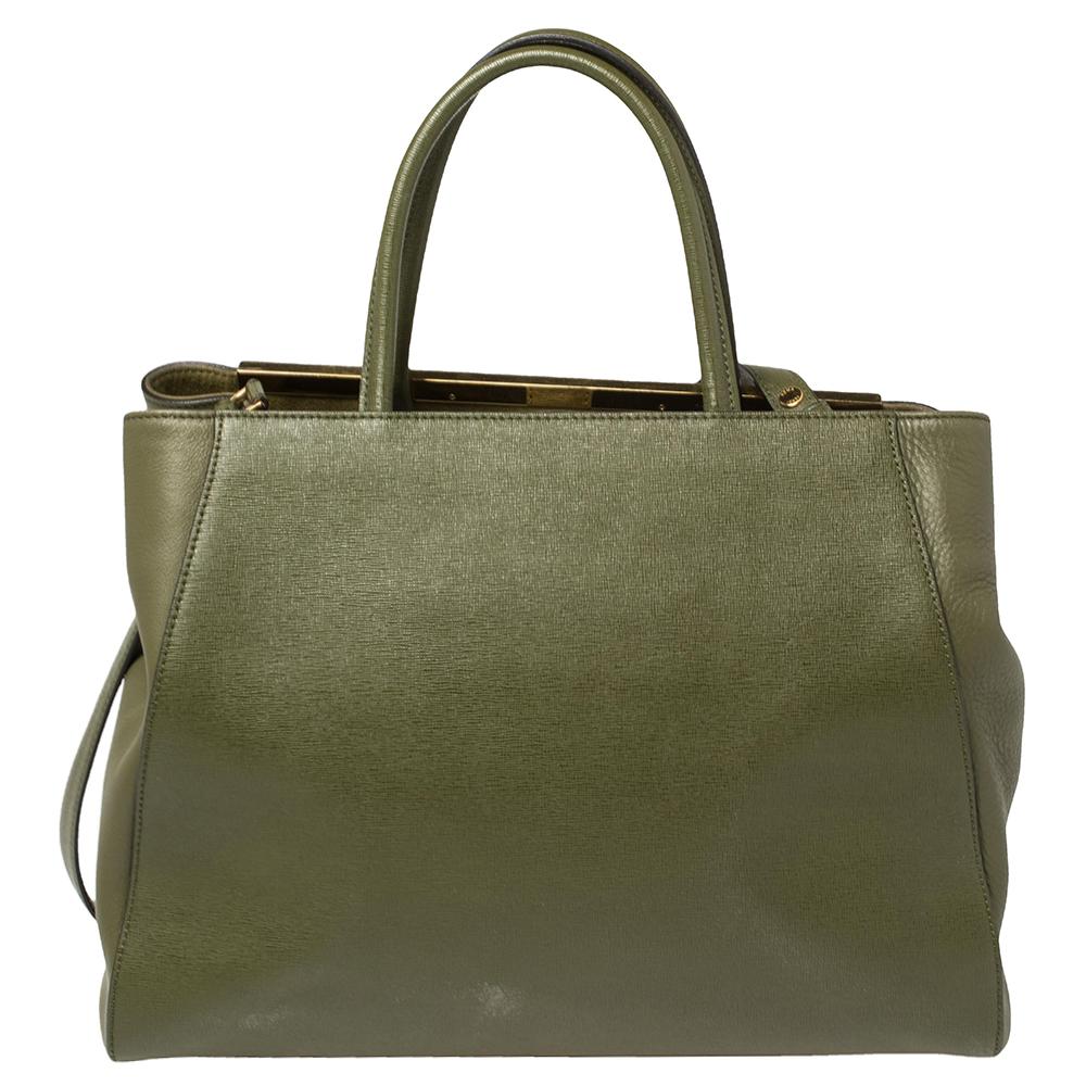 Fendi's 2Jours tote is one of the most iconic designs from the label and it still continues to receive the love of women around the world. Crafted from olive green leather, the bag features double rolled handles and a shoulder strap. It is also