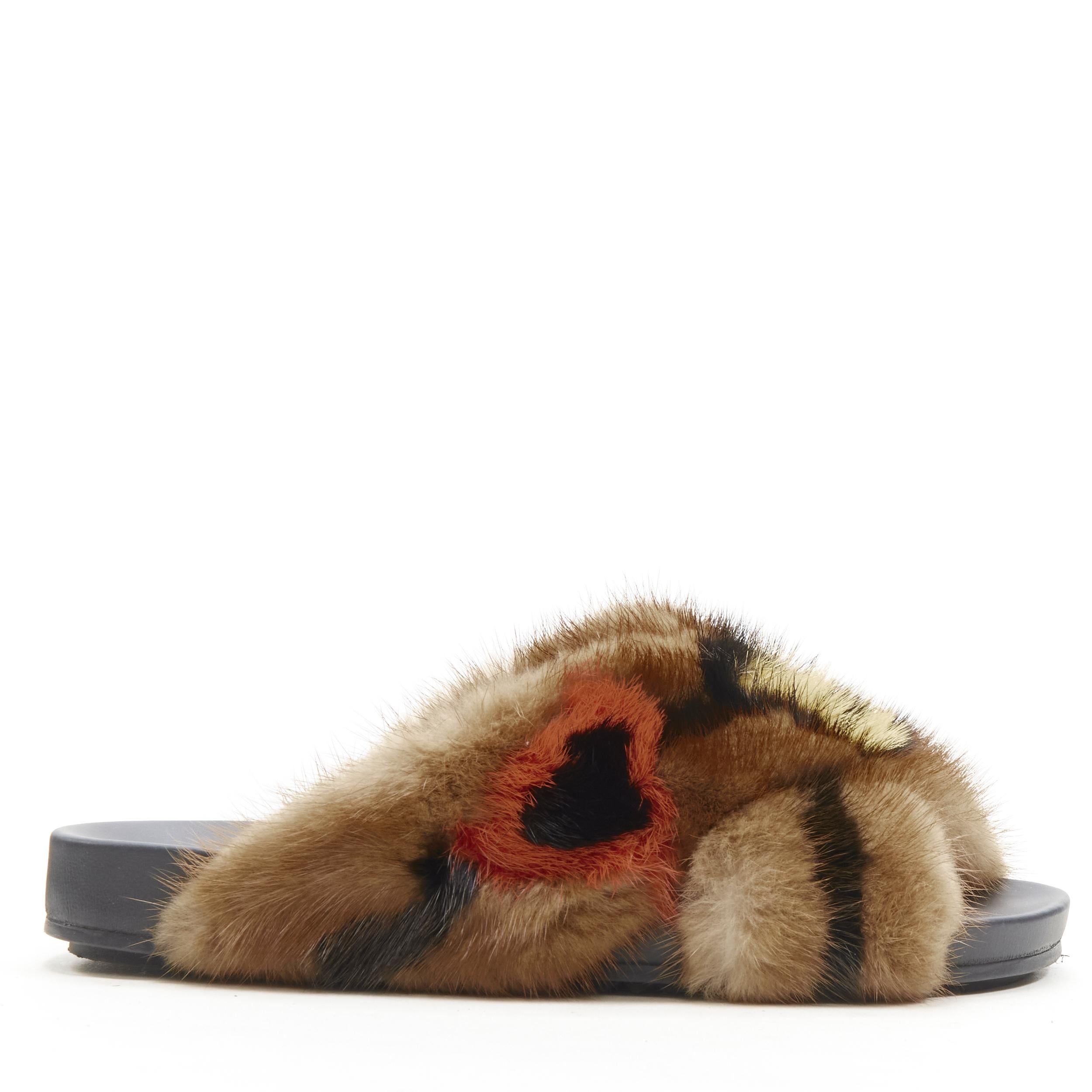 FENDI Open Your Heart brown mink fur cross strap slides sandals EU36 
Reference: ANWU/A00330 
Brand: Fendi 
Model: Open Your Heart 
Material: Fur 
Color: Brown 
Pattern: Solid 
Extra Detail: Genuine mink fur. 
Made in: Italy 


CONDITION: