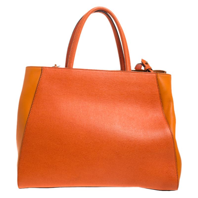 Fendi's 2Jours tote is one of the most iconic designs from the label and it still continues to receive the love of women around the world. Crafted from orange leather, the bag features double rolled handles. It is also equipped with a fabric