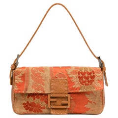 Baguette Selleria arancione Fendi