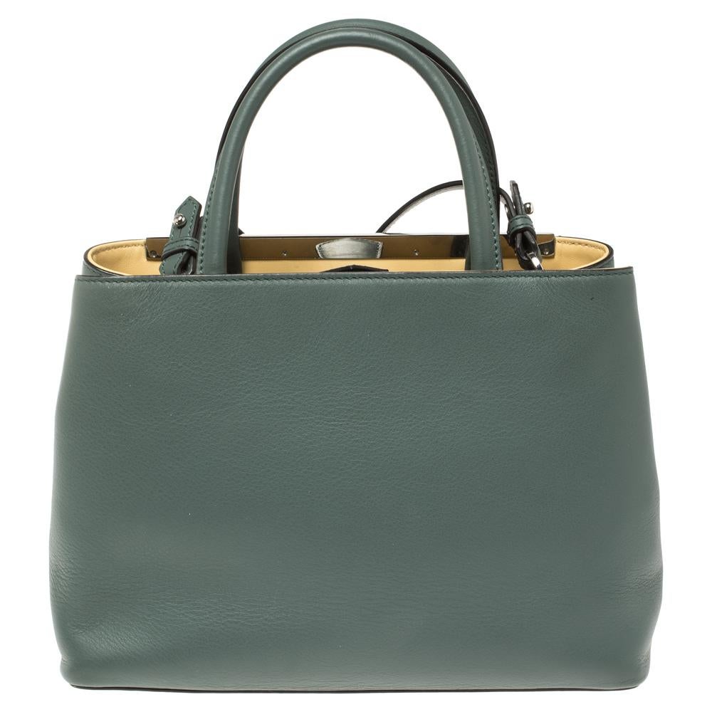 Fendi's 2Jours tote is one of the most iconic designs from the label and it still continues to receive the love of women around the world. Crafted from pale green leather, the bag features double rolled handles. It is also equipped with a leather