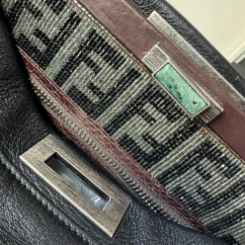 Fendi Peekaboo Large Black Calfskin Leather Glitter Beaded Zucca Interior
 These are professional photos of the actual bag.
 This large Fendi Peekaboo is crafted from high quality calfskin leather, and opens to reveal an interior that's lined with