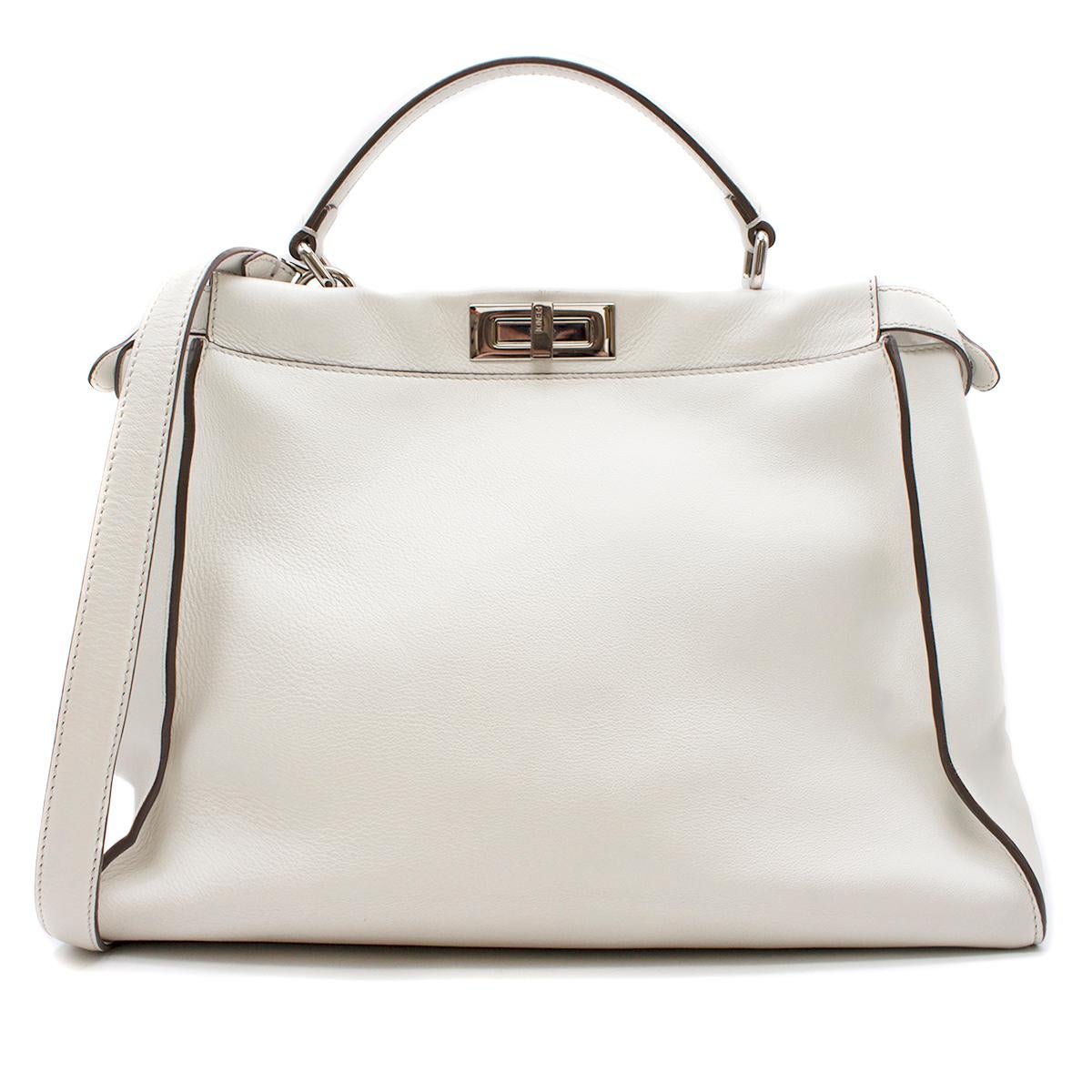 Fendi Peekaboo Large Limited Edition white leather tote

- White, leather
- Single top handle, detachable leather shoulder strap
- Logo-engraved silver-tone metal hardware, taupe-brown lacquered edges 
- Push-stud side straps 
- Front and back