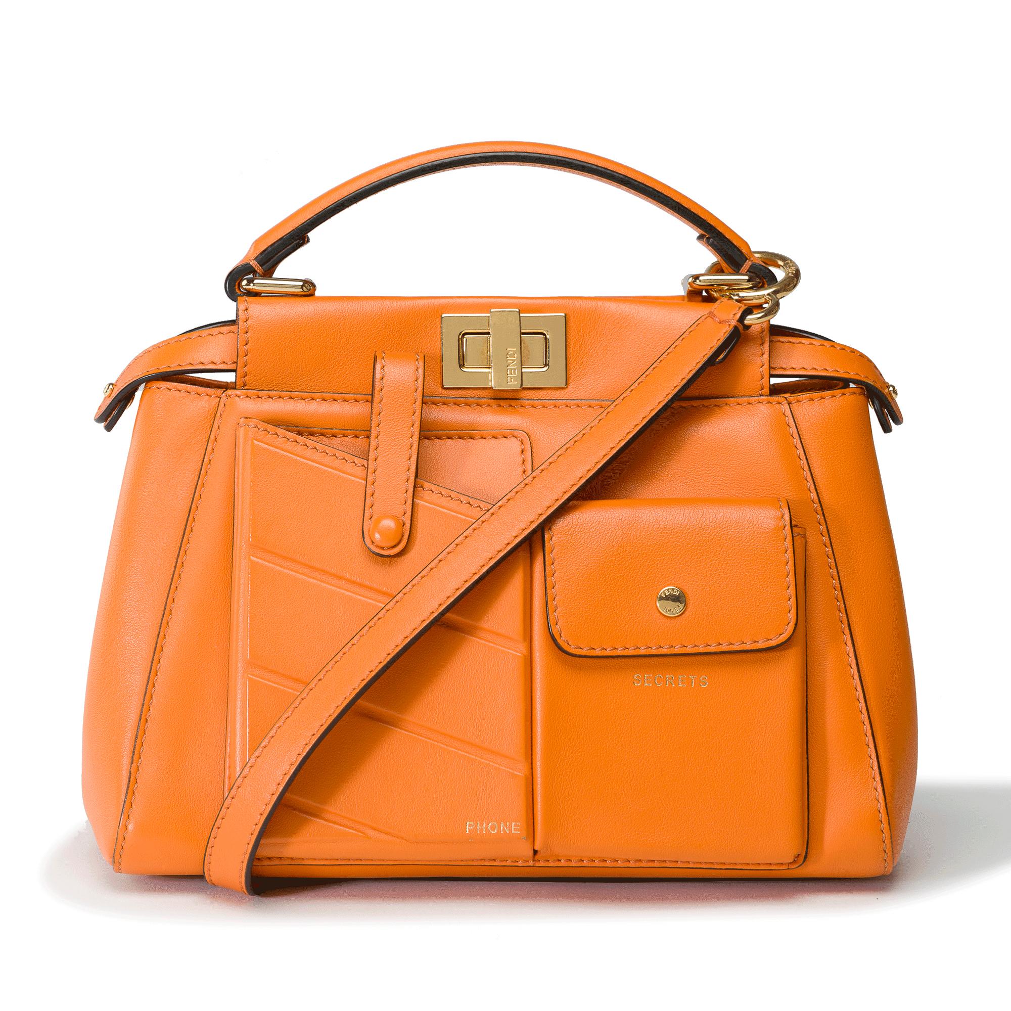 Fendi​ ​once​ ​again​ ​reinvents​ ​the​ ​classic​ ​Peekaboo​ ​Mini​ ​Pocket,​ ​this​ ​time​ ​with​ ​pockets.​ ​Decorated​ ​with​ ​2​ ​exterior​ ​pockets​ ​of​ ​different​ ​sizes,​ ​this​ ​version​ ​embodies​ ​even​ ​more​ ​the​ ​versatile​ ​aspect​