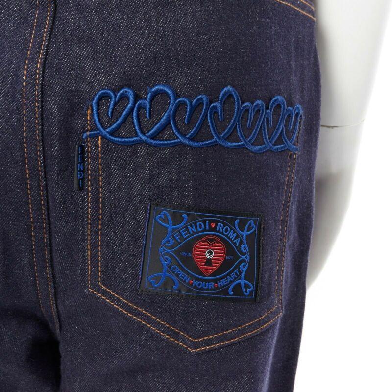FENDI PF18 indigo blue crisp denim straight jeans 3/4 heart embroidery IT40 S
Reference: TGAS/A03266
Brand: Fendi
Collection: Pre fALl 2018
Material: Cotton
Color: Blue
Pattern: Solid
Closure: Zip
Extra Details: Straight legged cut. Boyfriend style.