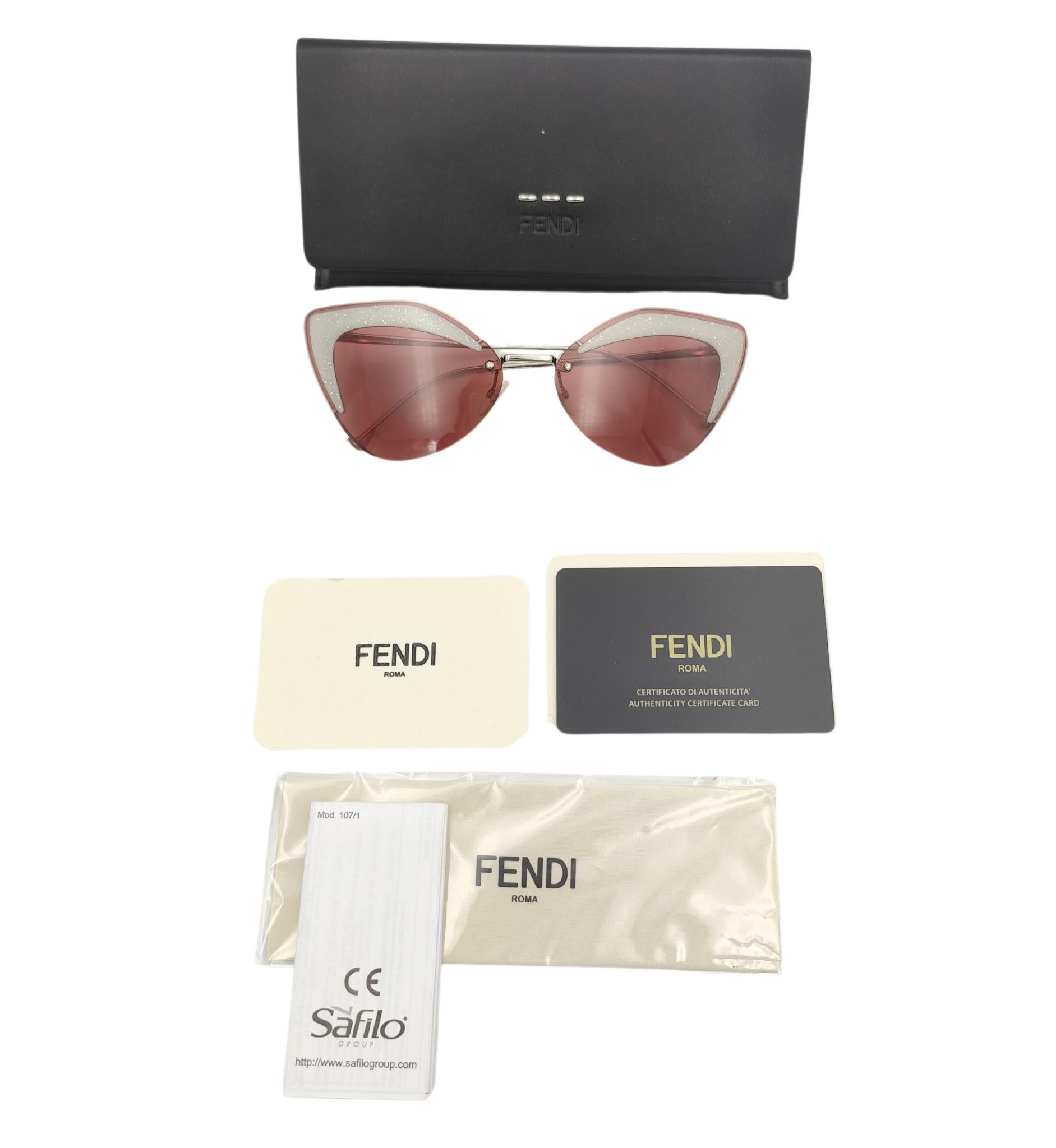 Fendi sunglasses
Pink
White glitter details

Great condition
Come with case and accessories